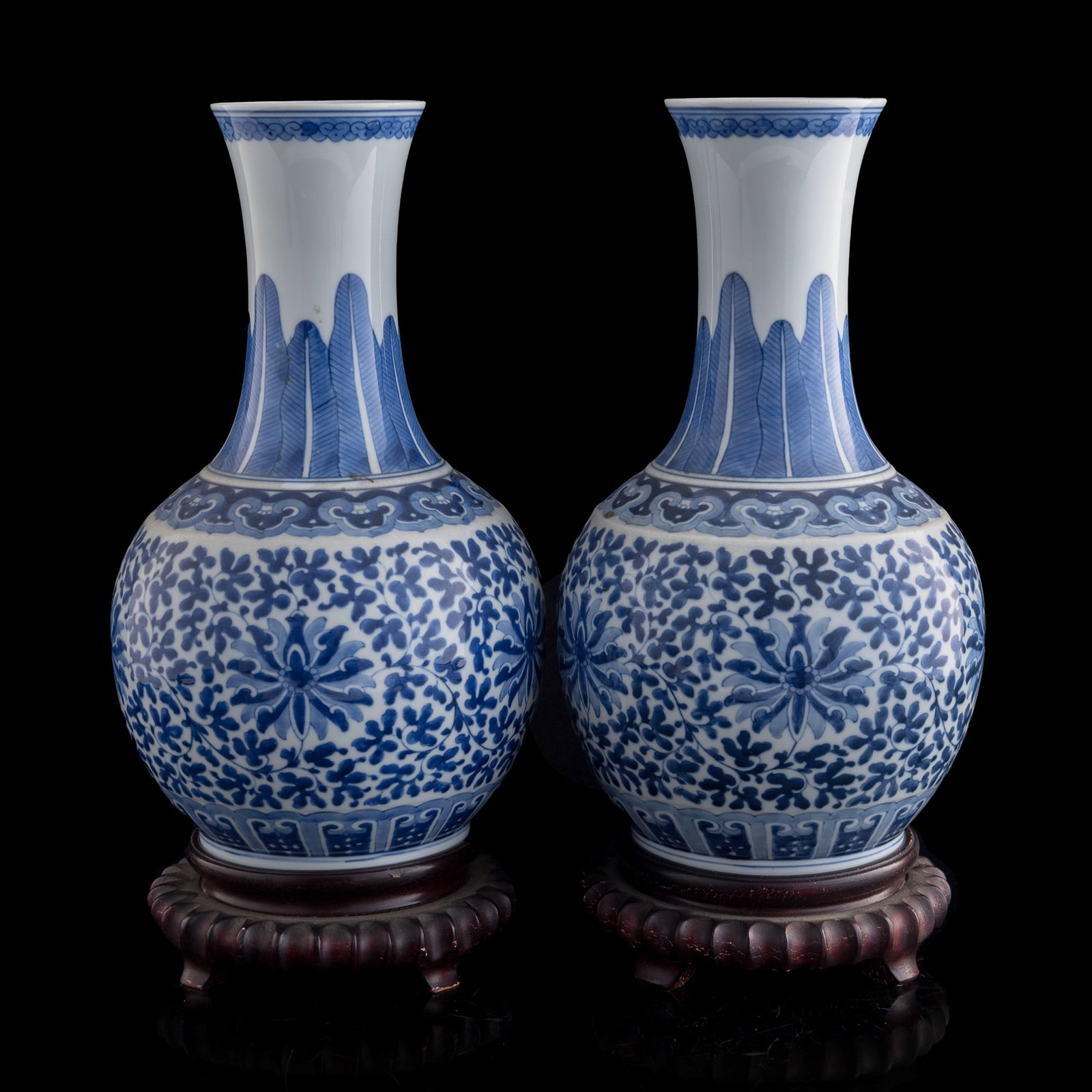 A pair of Chinese blue and white 'lotus scroll' shang vases, late 19th century (1 of 8)