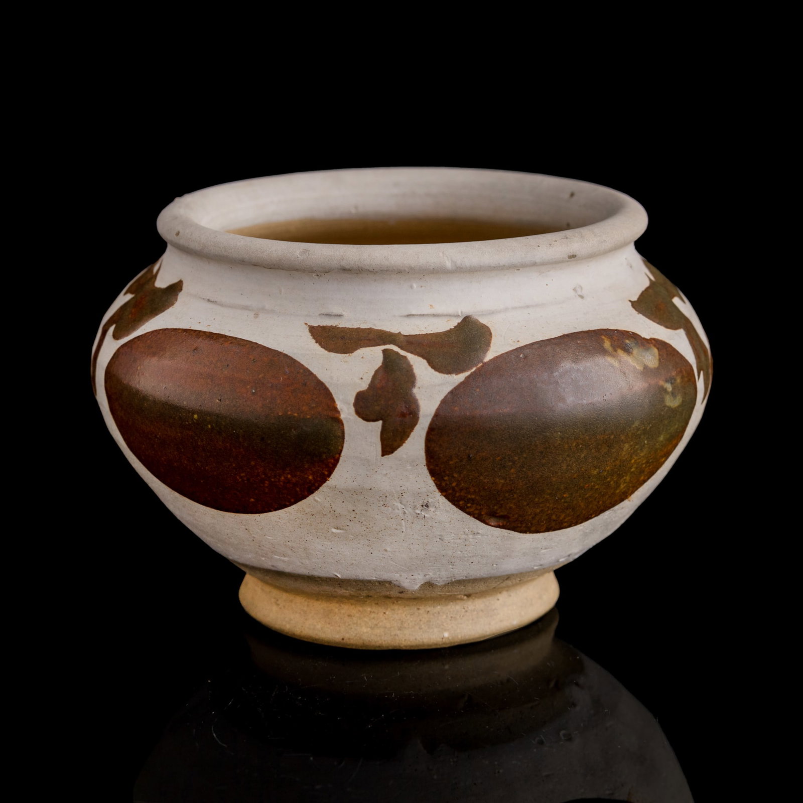 A Chinese Cizhou ware jar, Ming dynasty or earlier (1 of 6)