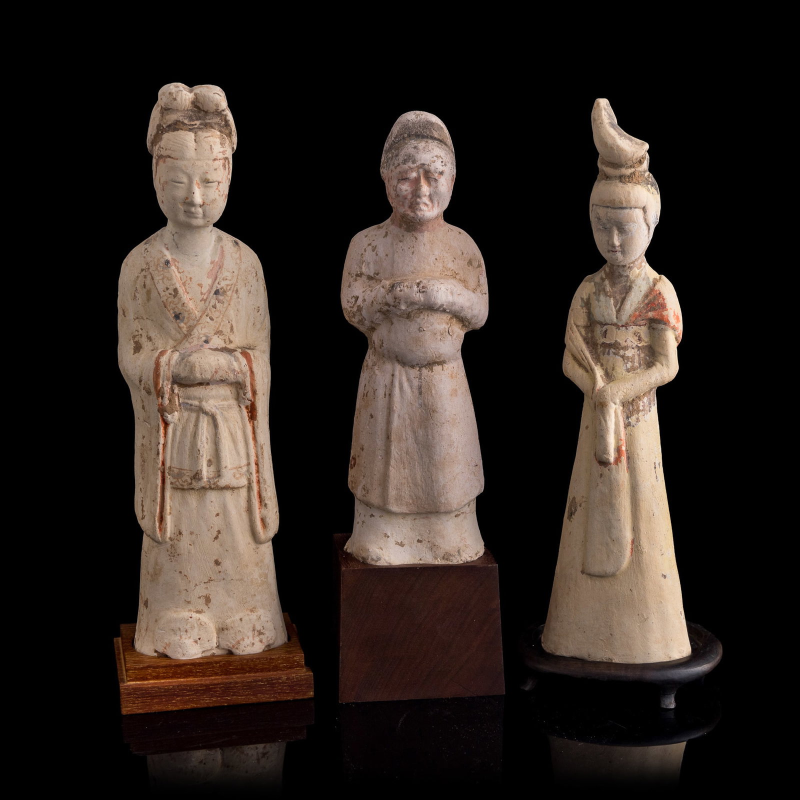 A set of three Chinese pottery figures, Tang dynasty (1 of 11)