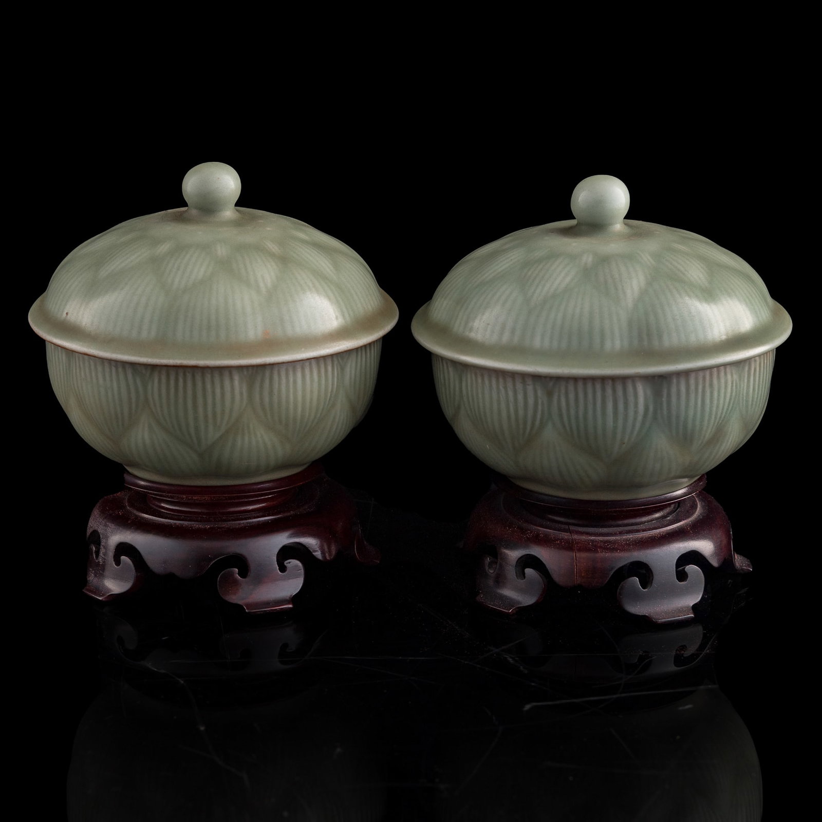 A pair of Chinese Longquan celadon covered bowls, Ming dynasty or earlier (1 of 9)