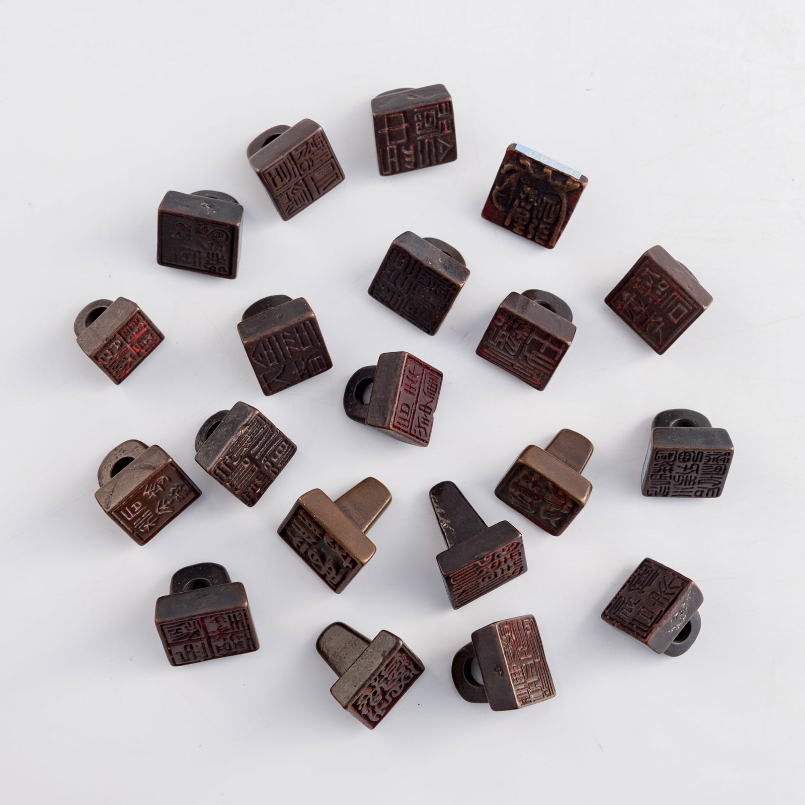 Twenty Chinese bronze seals with nose-form finials, Ming/Qing dynasty (1 of 12)