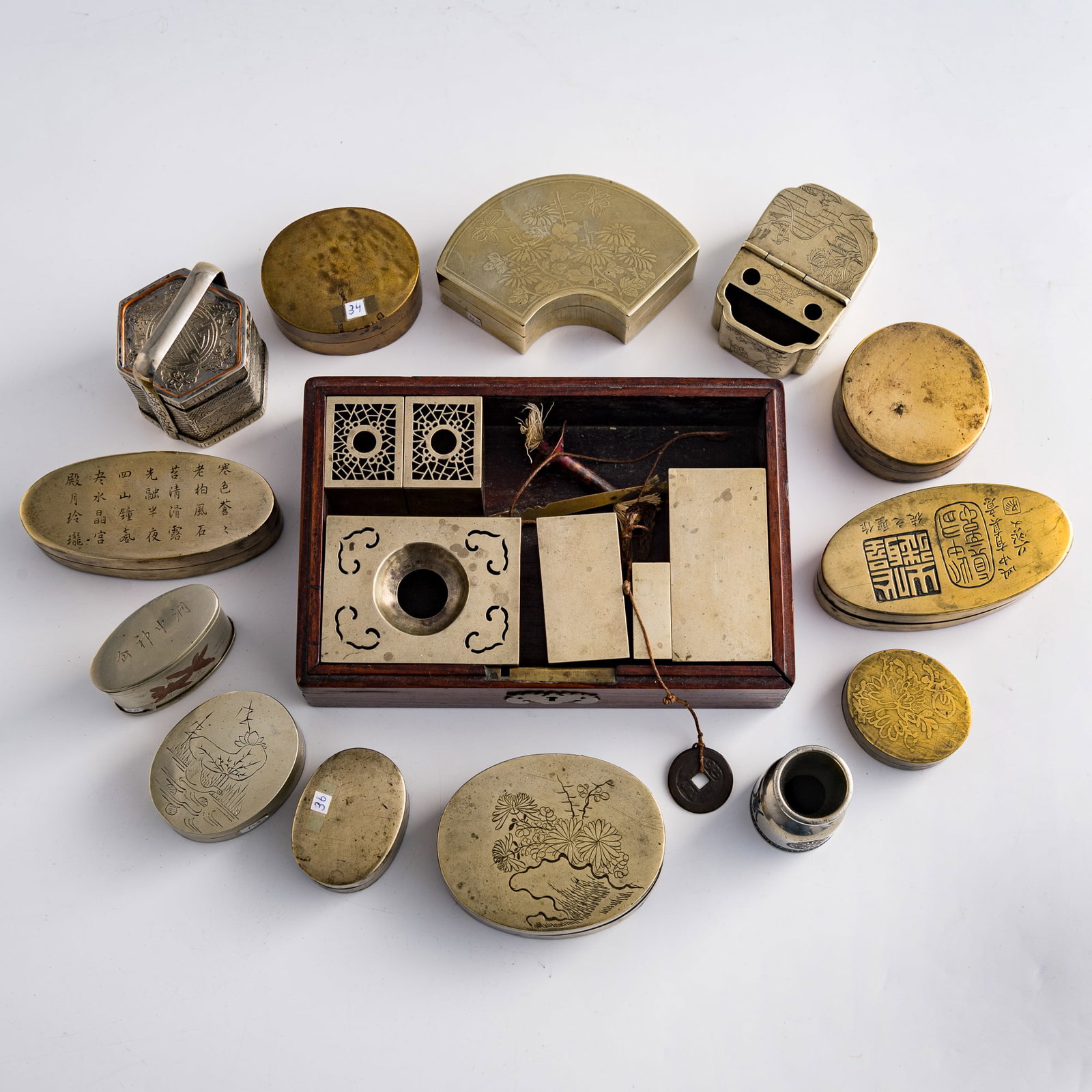 A group of Chinese copper-alloy ink boxes and scholar's objects, Qing dynasty/Republic period (1 of 13)
