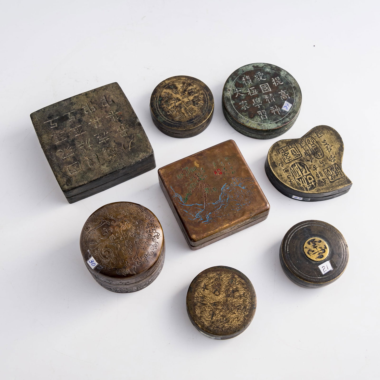 Eight Chinese copper-alloy ink boxes, Qing dynasty/Republic period: Eight Chinese copper-alloy ink boxes Qing dynasty/Republic period H: 1 1/4, W: 3 3/8, D: 3 3/8 in. (H: 3.2, W: 8.6, D: 8.6 cm. (largest)) Weight: 1300 g (overall) Private collection, Charlottesville, 