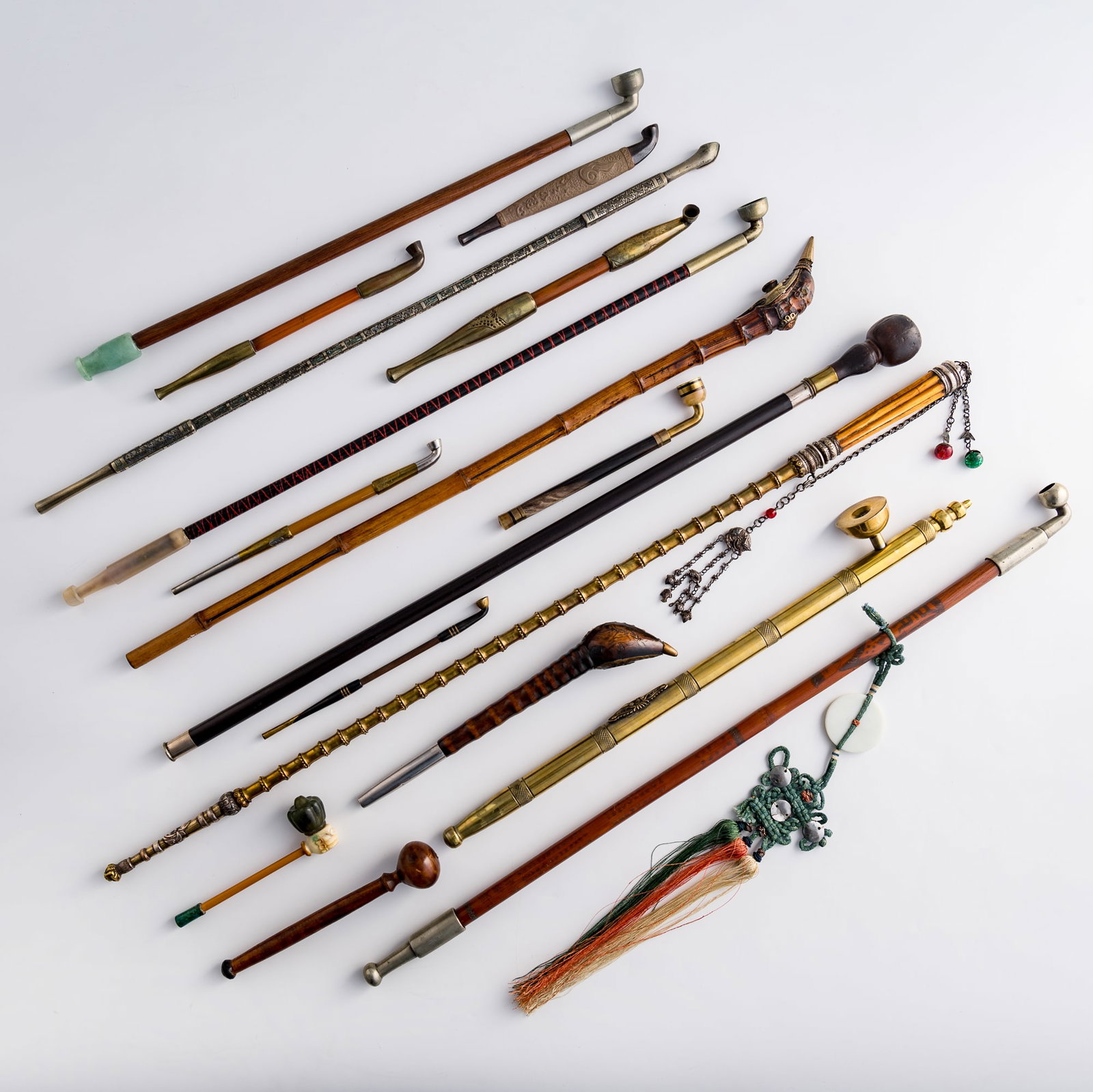 A group of assorted smoking pipes and accessories, 19th century or later (1 of 9)