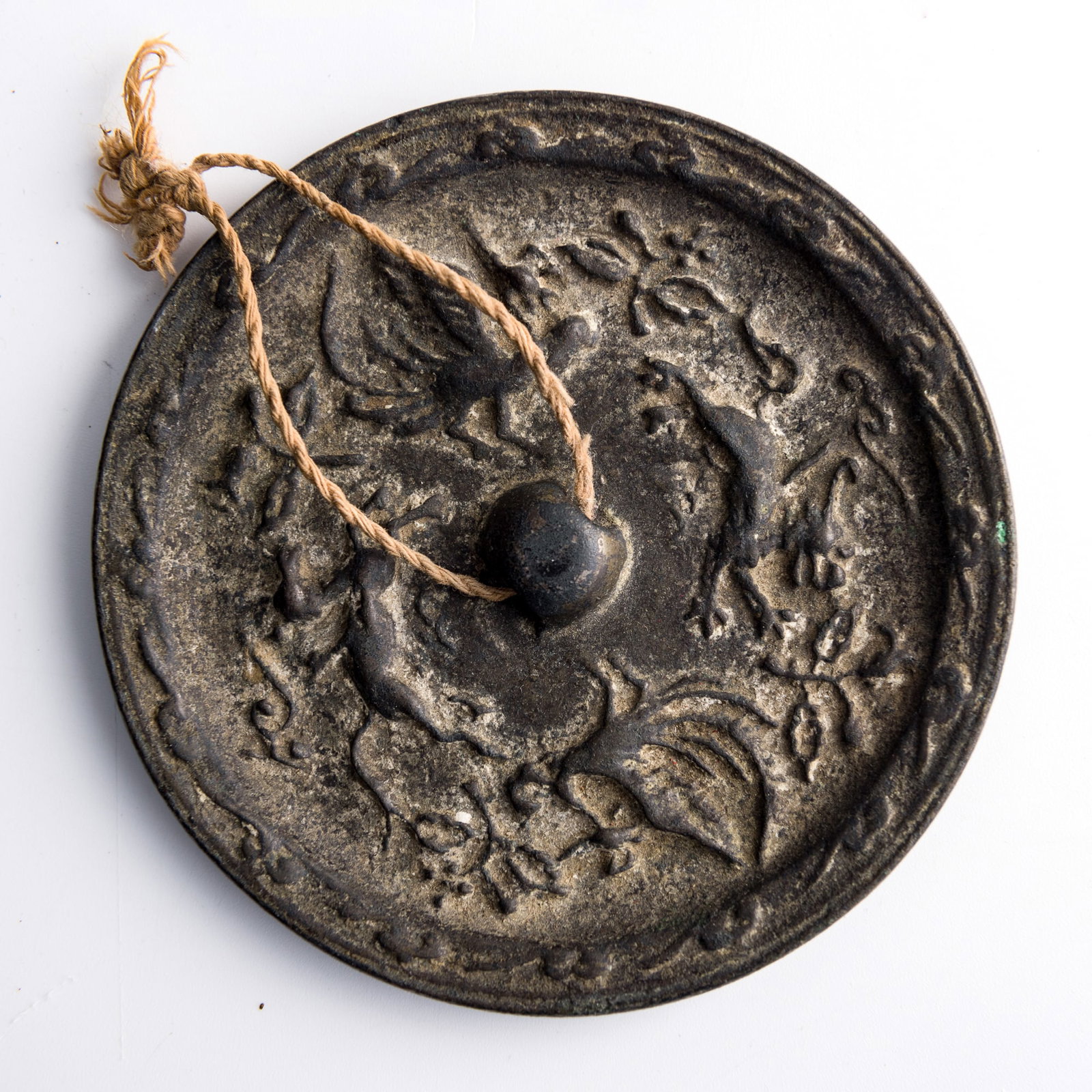 A Chinese bronze 'four beasts' mirror, Han dynasty (1 of 7)