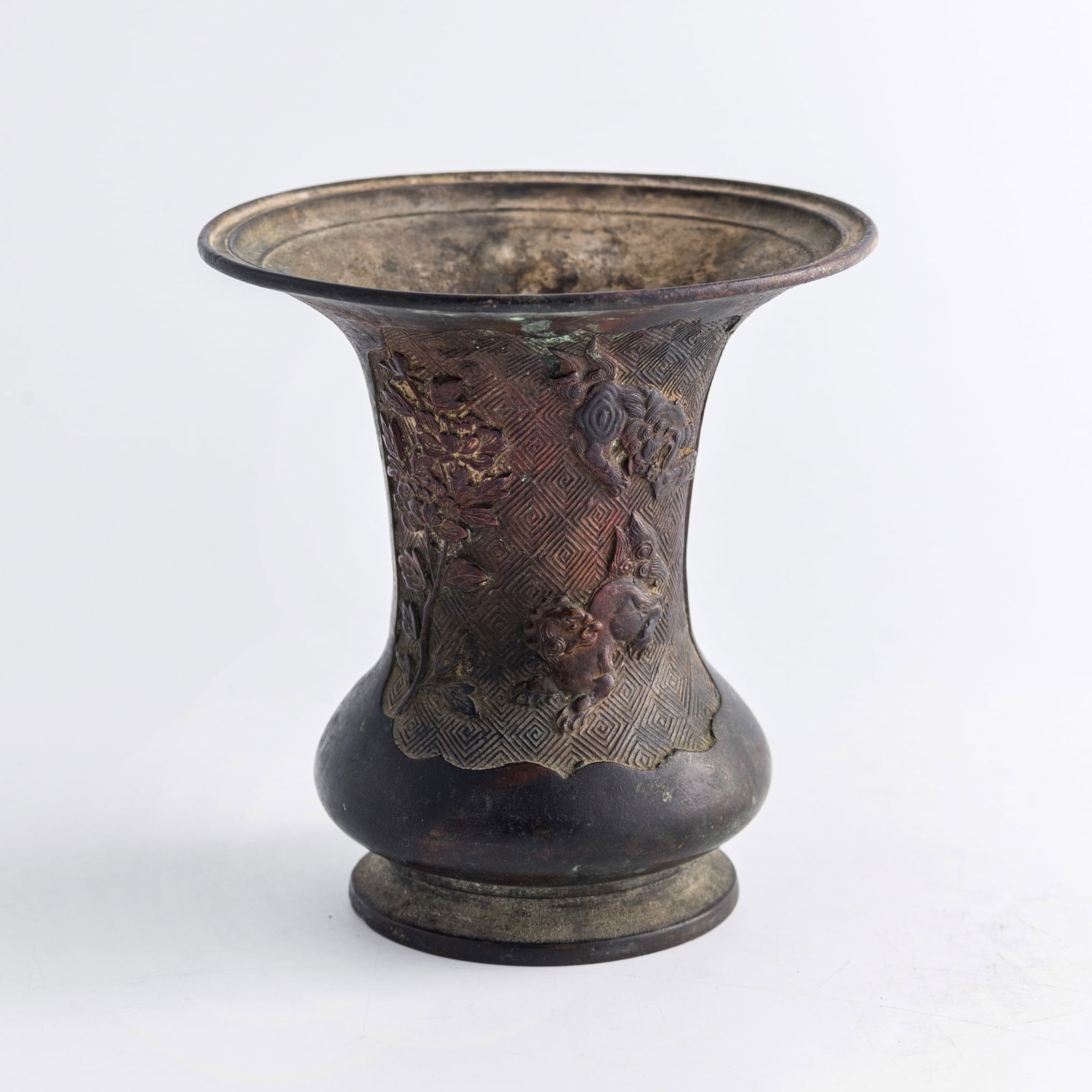 A Chinese copper-alloy 'figure' gu vessel, Ming dynasty (1 of 9)