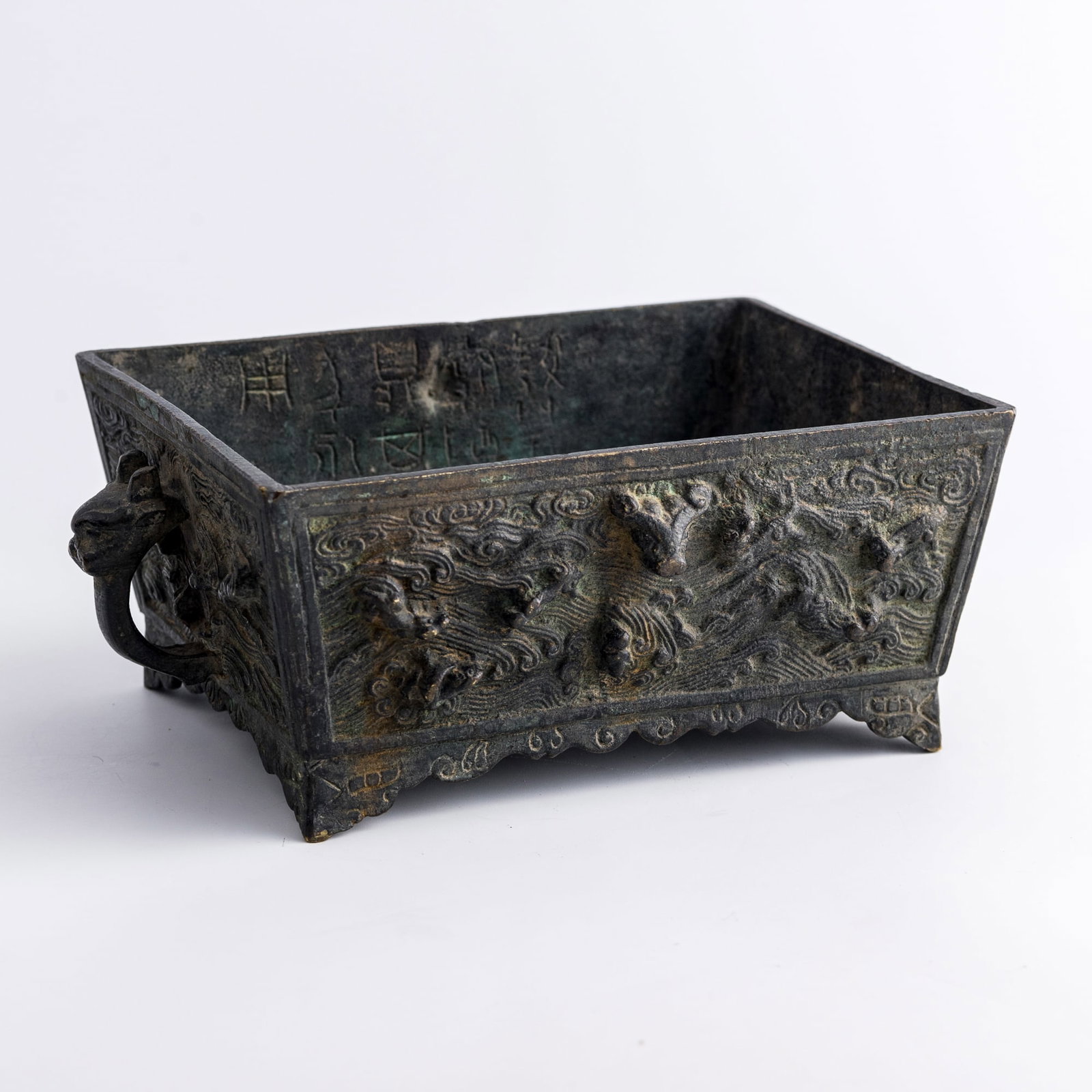 A Chinese bronze censer with inscription and beast-form handles, Ming dynasty: A Chinese bronze censer with inscription and beast-form handles Ming dynasty H: 3 1/4, W: 8 7/8, D: 5 5/8 in. (H: 8.3, W: 22.5, D: 14.3 cm.) Weight: 1689 g Private collection, San Jose, California.