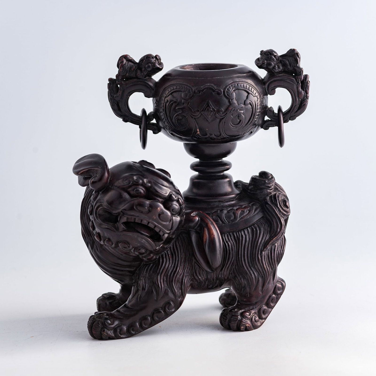 A Chinese stone lion-form incense burner, 19th century: A Chinese stone lion-form incense burner 19th century H: 6 5/8, W: 5 3/4, D: 3 5/8 in. (H: 16.8, W: 14.6, D: 9.2 cm.) From Mrs. Houghton, Huntington Beach, California.