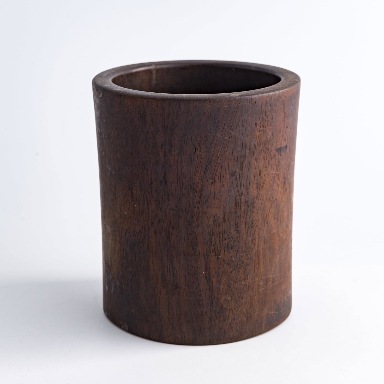 A Chinese huanghuali brush pot, 18th century: A Chinese huanghuali brush pot 18th century H: 5 5/8, Dia: 4 3/4 in. (H: 14.3, Dia: 12.1 cm.) From Mrs. Yang, New Jersey; collected by her late husband. Cli