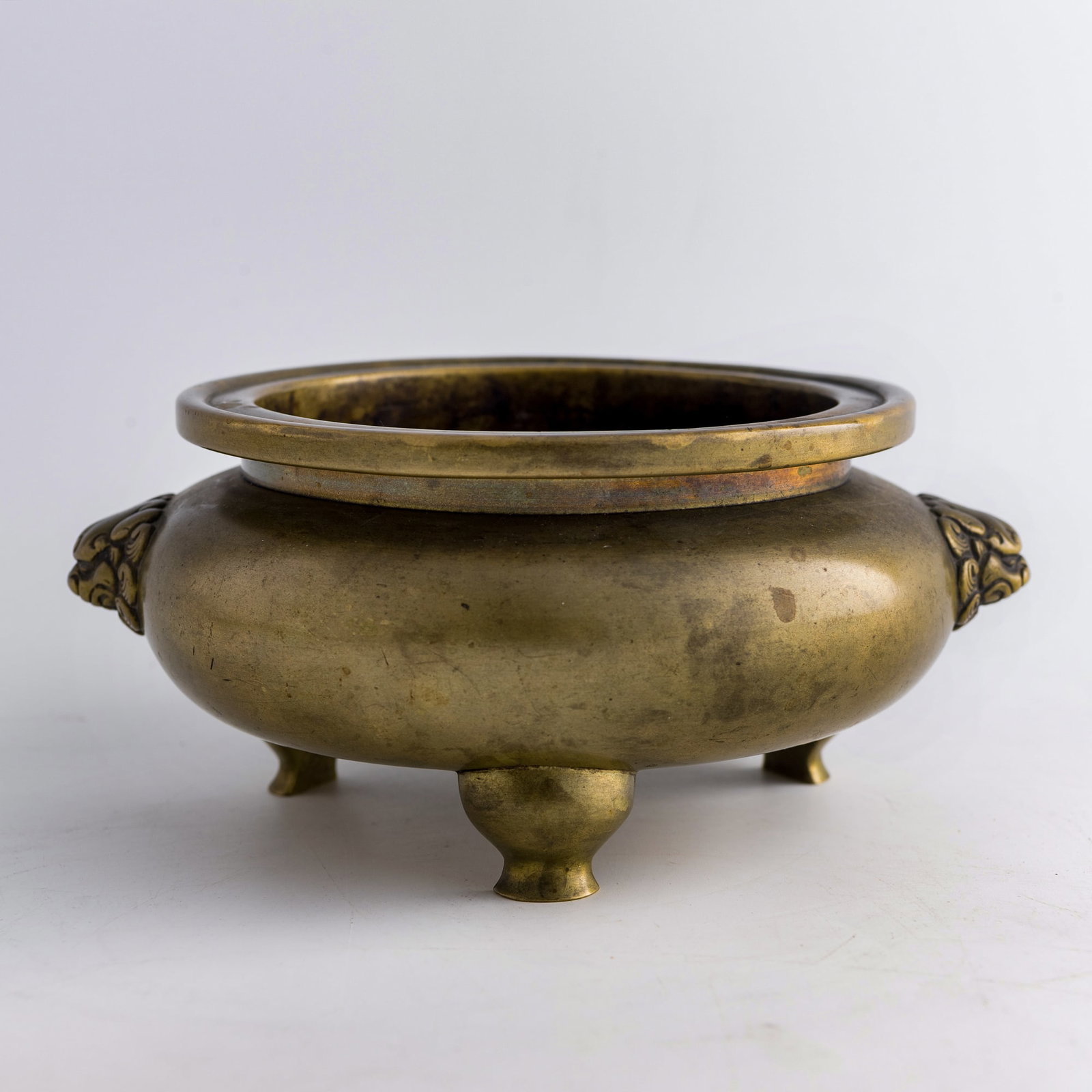 A Chinese bronze tripod censer with beast handles, early 19th century (1 of 8)