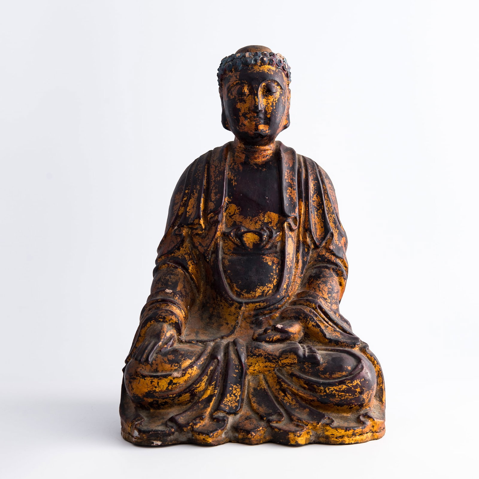 A Chinese gilt-lacquered wood figure of Sakyamuni, Ming dynasty (1 of 9)