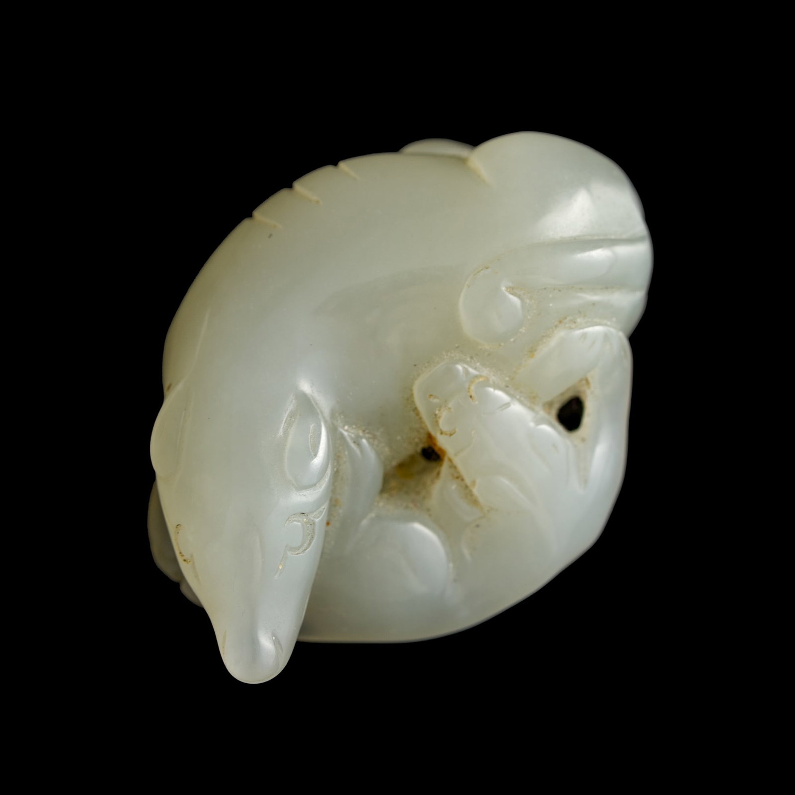 A Chinese white jade pendant of double badgers, 18th century (1 of 6)