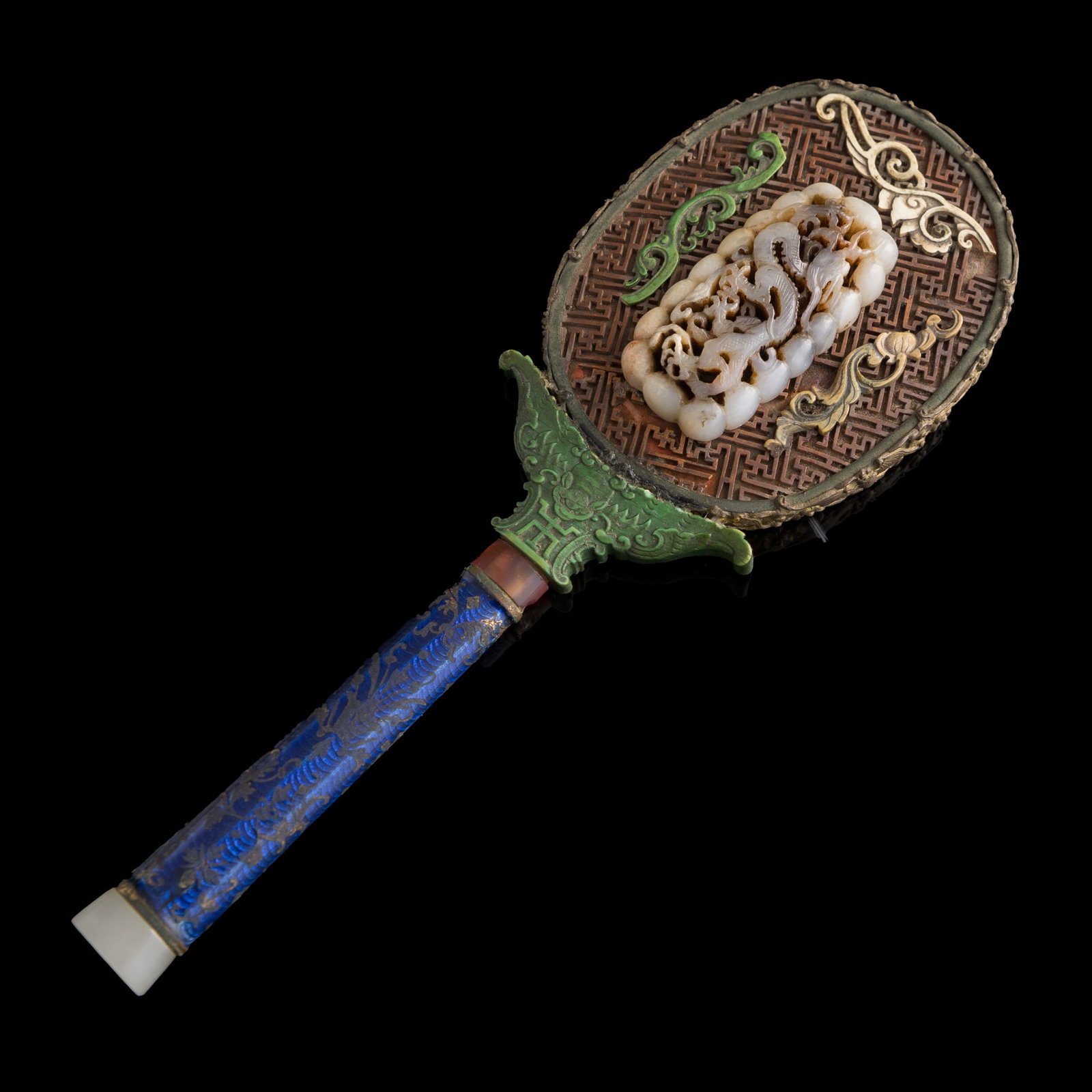 A Chinese handheld mirror inset with a Ming dynasty jade plaque, Qianlong period, Qing dynasty (1 of 8)