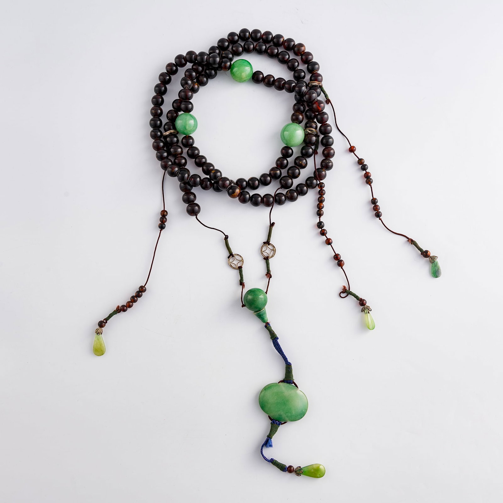 A Chinese amber and glass court necklace, Qing dynasty (1 of 12)