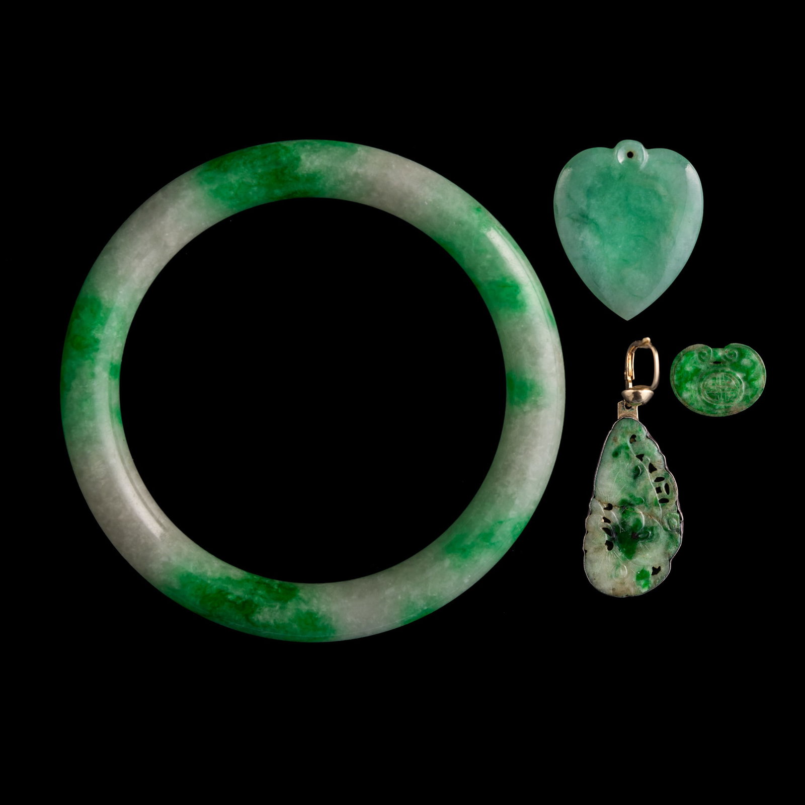 A Chinese bangle and three accessories, possibly jadeite (1 of 7)
