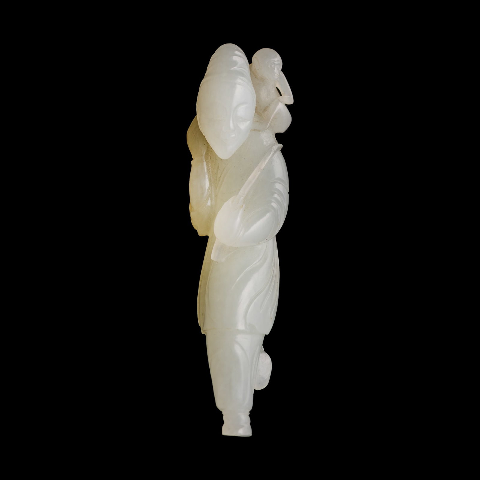 A Chinese white jade pendant of a figure, 18th century: A Chinese white jade pendant of a figure 18th century H: 3, W: 1, D: 3/4 in. (H: 7.6, W: 2.5, D: 1.9 cm.) Private collection, New York. Click here for high resolution images.