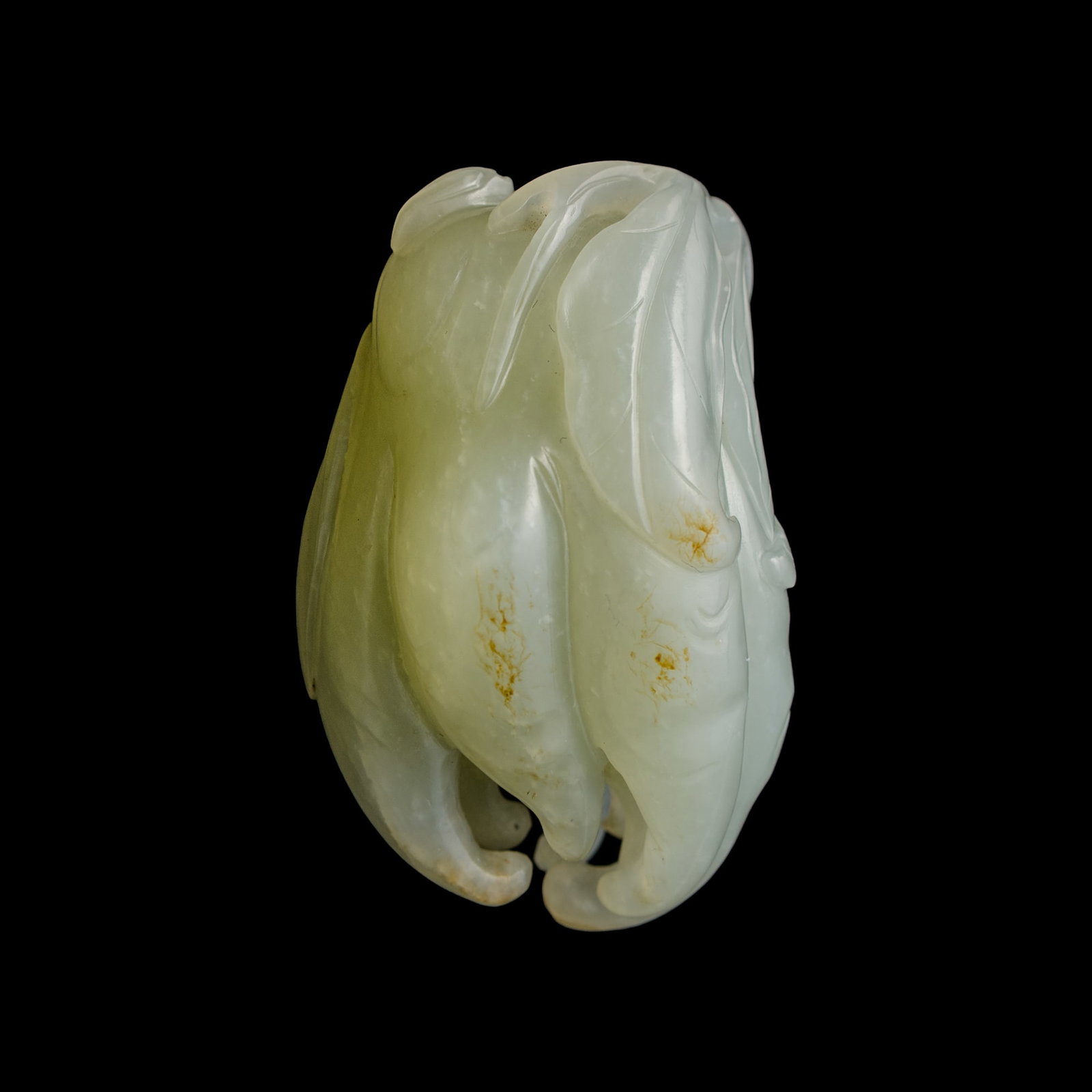 A Chinese white jade Buddha's hand citron-form pendant, early 19th century (1 of 8)