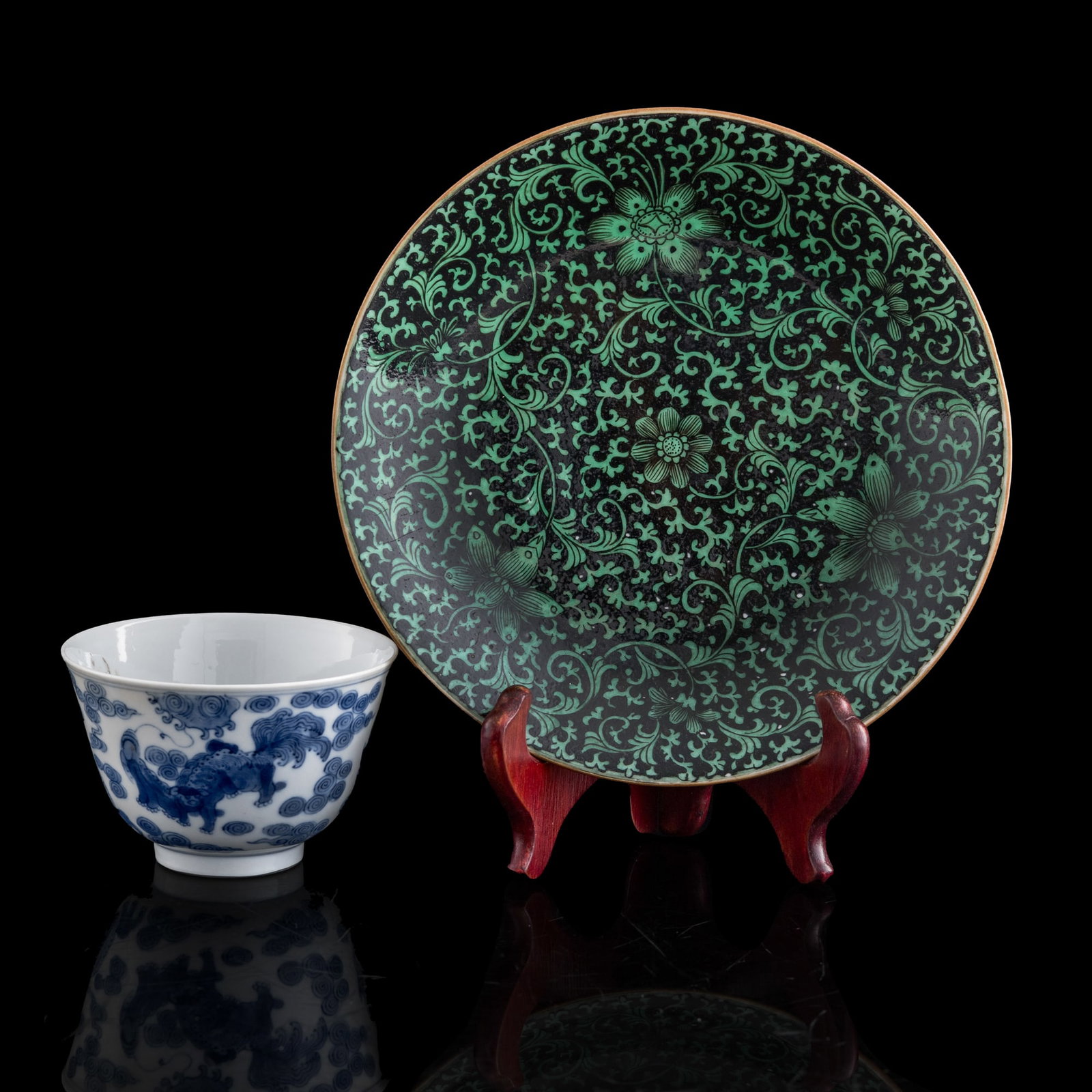 A Chinese black-ground green-enameled dish and a blue-and-white cup (1 of 10)