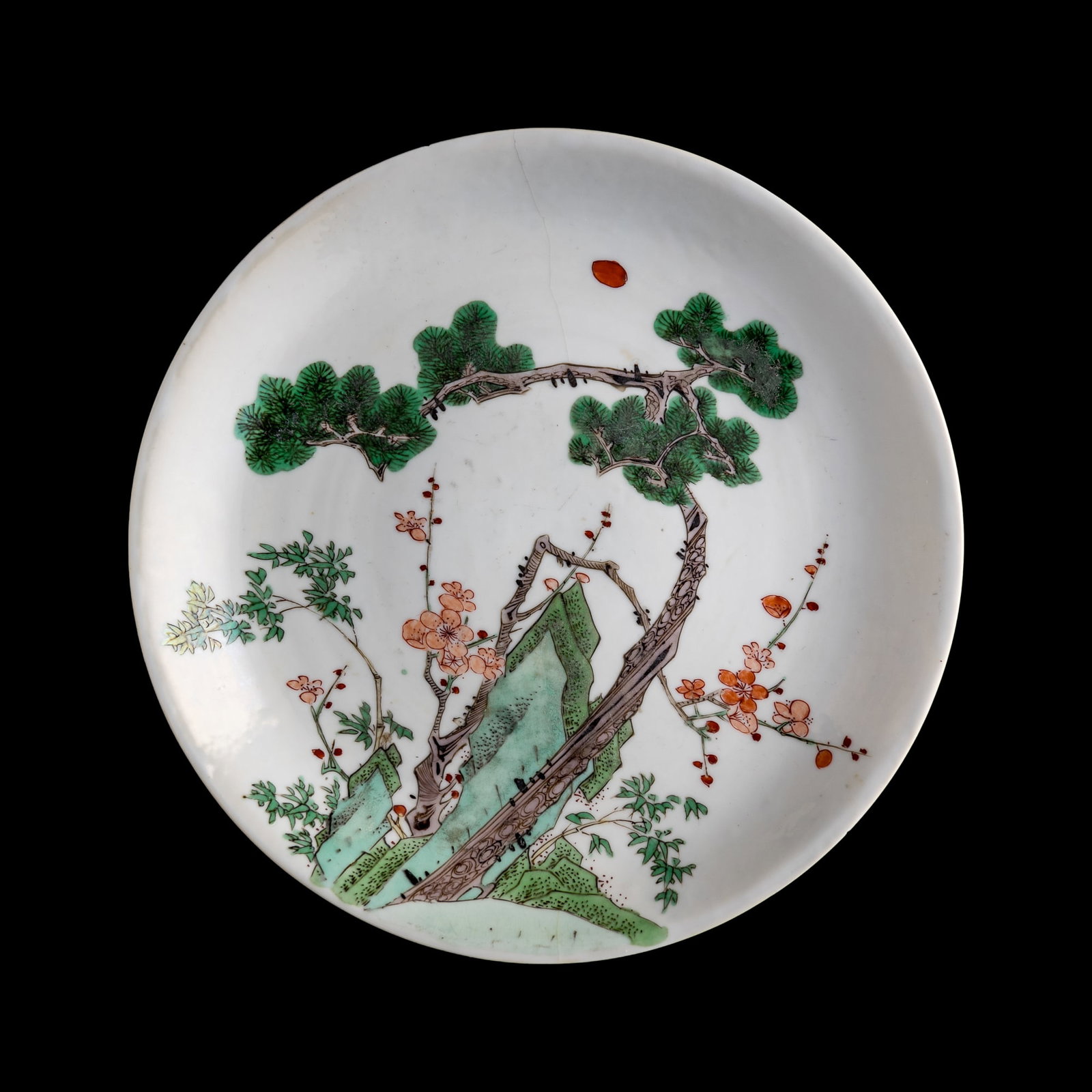 A Chinese wucai 'Three Friends of Winter' plate, Kangxi period, Qing dynasty: A Chinese wucai 'Three Friends of Winter' plate Kangxi period, Qing dynasty With a 'censer' motif mark within double circle to underside. H: 1 1/4, Dia: 8 1/4 in. (H: 3.2, Dia: 21 cm.) Private collect