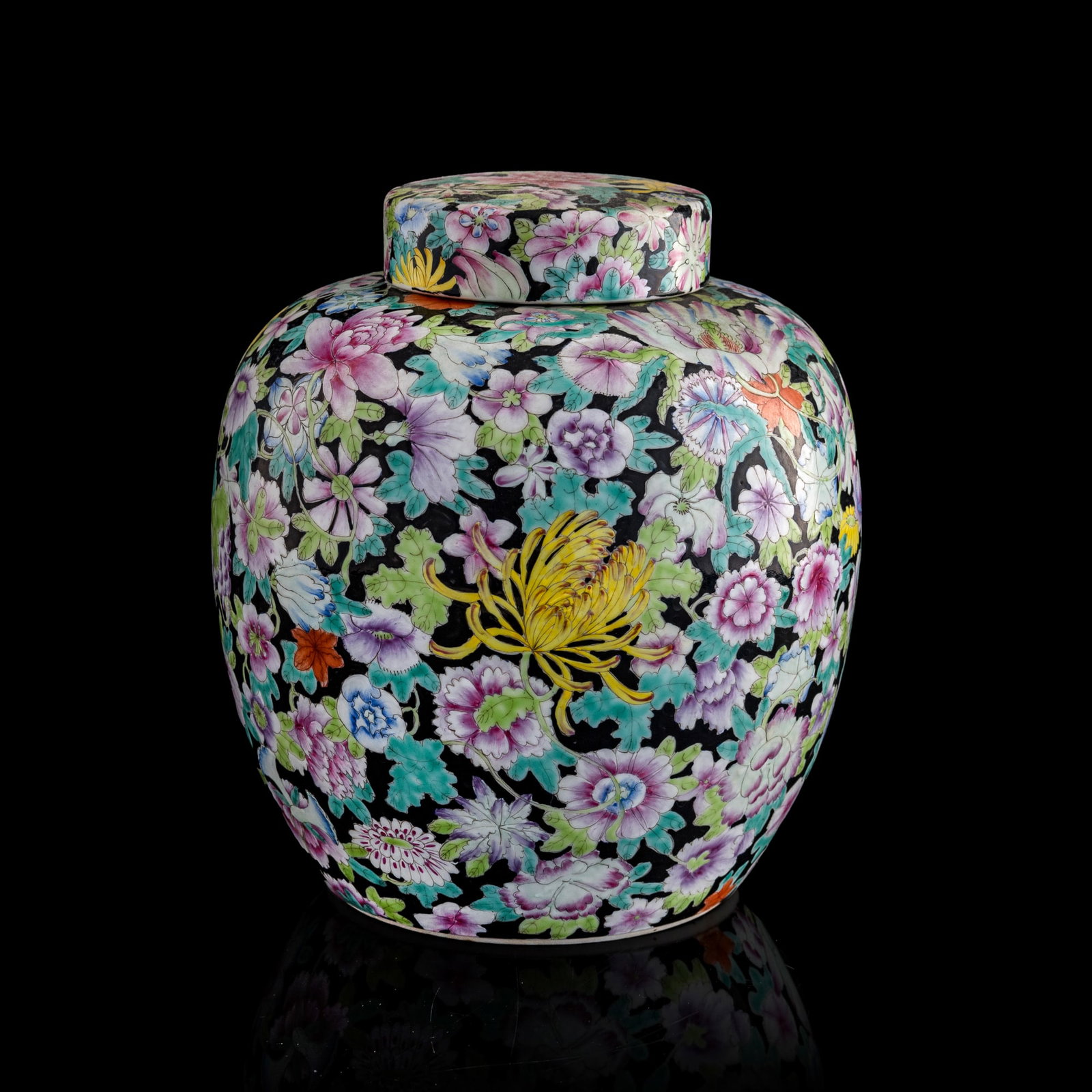 A Chinese black-ground famille rose 'mille fleur' covered jar, Republic period: A Chinese black-ground famille rose 'mille fleur' covered jar Republic period With six-character mark to underside. H: 9 7/8, Dia: 8 5/8 in. (H: 25.1, Dia: 21.9 cm.) Private collection, Potomac, Maryl