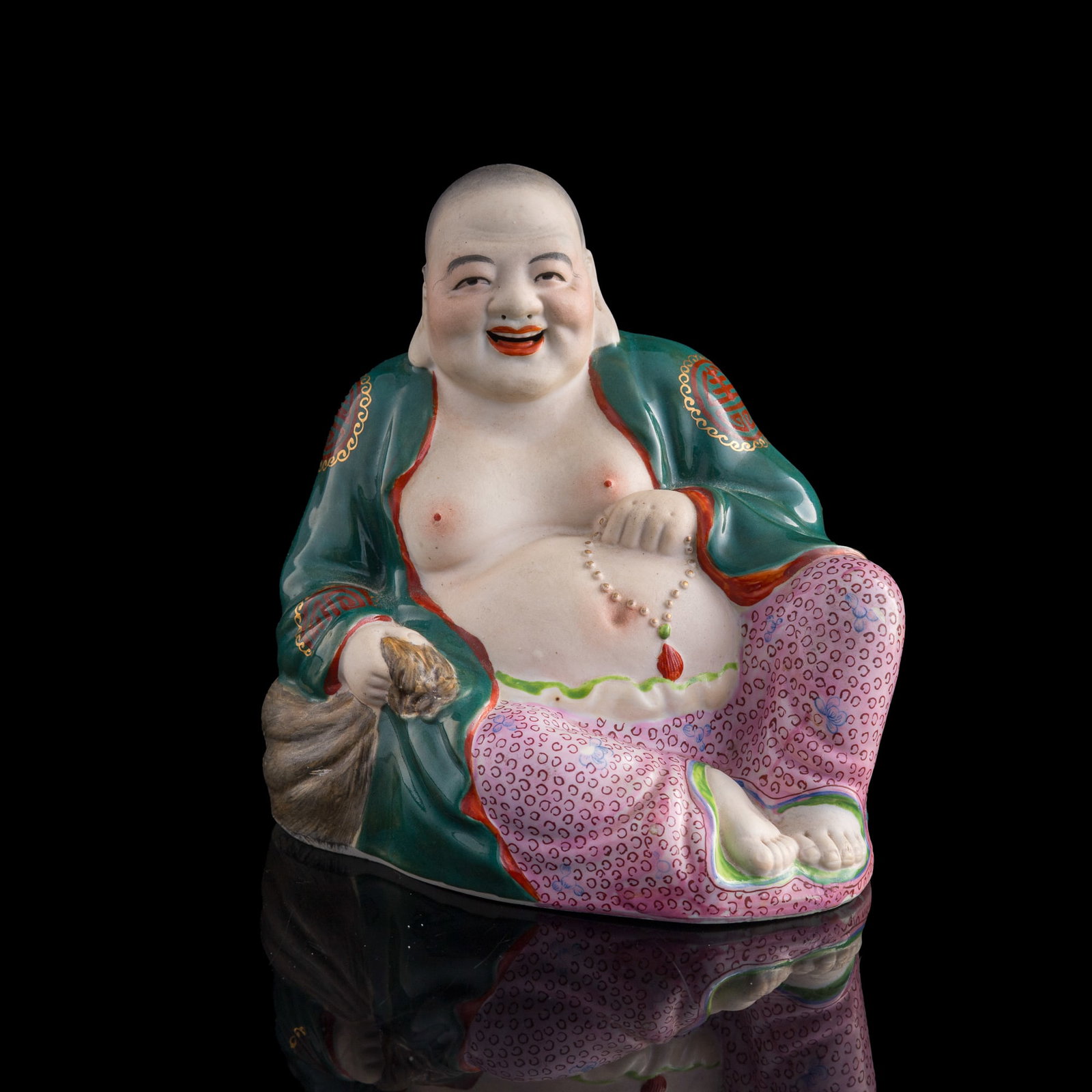 A Chinese famille rose Buddha, 1960s-1970s: A Chinese famille rose Buddha 1960s-1970s With impressed mark to underside. H: 6 3/4, W: 6 1/4, D: 5 1/4 in. (H: 17.1, W: 15.9, D: 13.3 cm.) Private collection, Rowland Heights, California. Private co