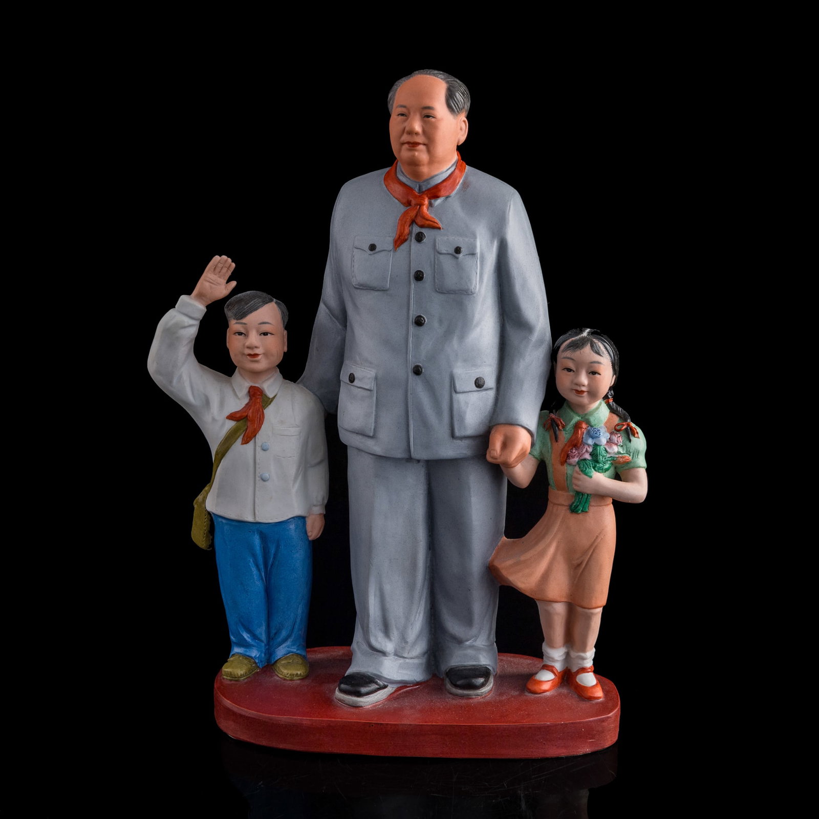 A Chinese porcelain figural group of Mao Zedong with two children, 1960s-1970s: A Chinese porcelain figural group of Mao Zedong with two children 1960s-1970s H: 13 1/4, W: 10 3/8, D: 4 in. (H: 33.7, W: 26.4, D: 10.2 cm.) Private collection, Rowland Heights, California. Private co