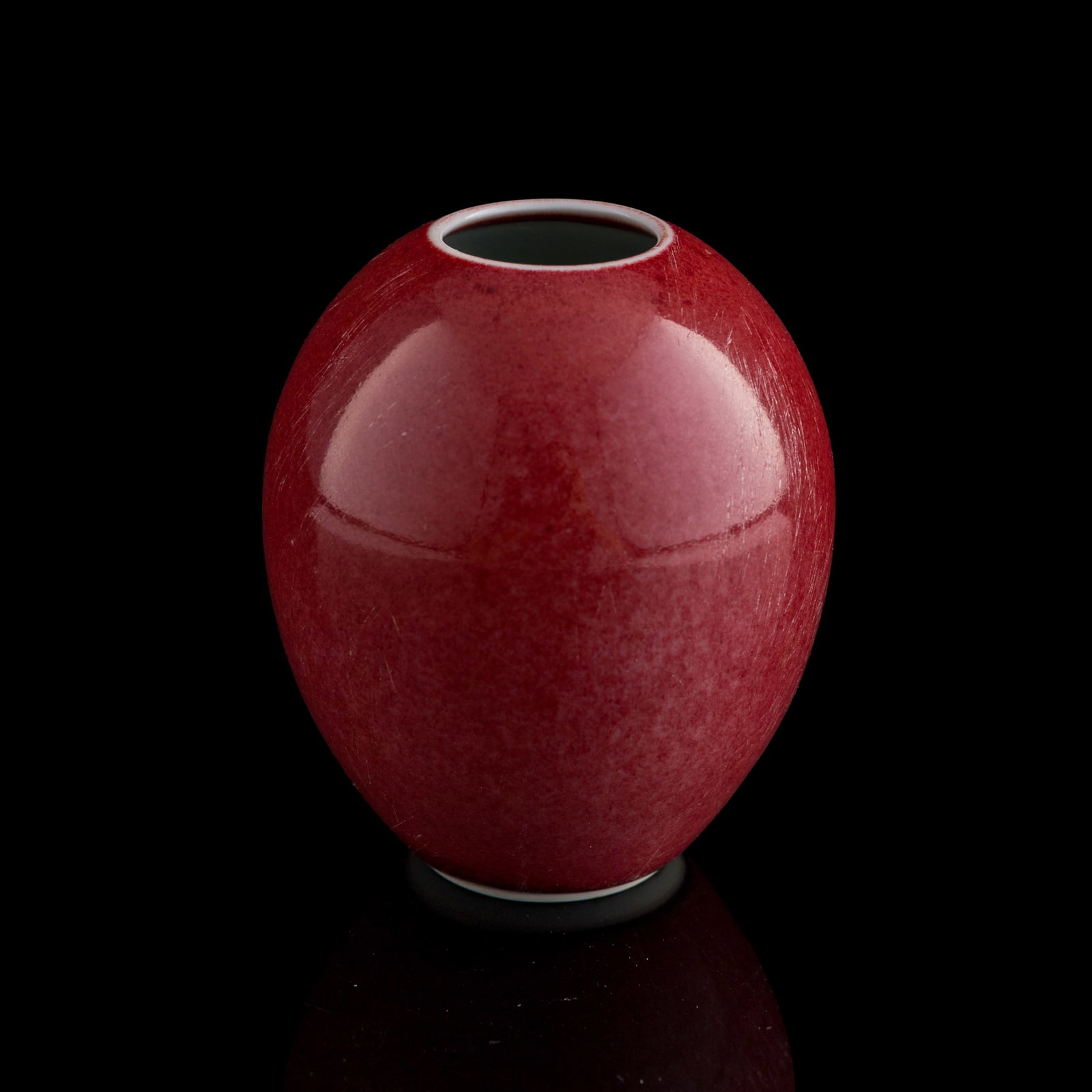 A Chinese sacrificial-red-glazed water coupe, Qing dynasty (1 of 7)