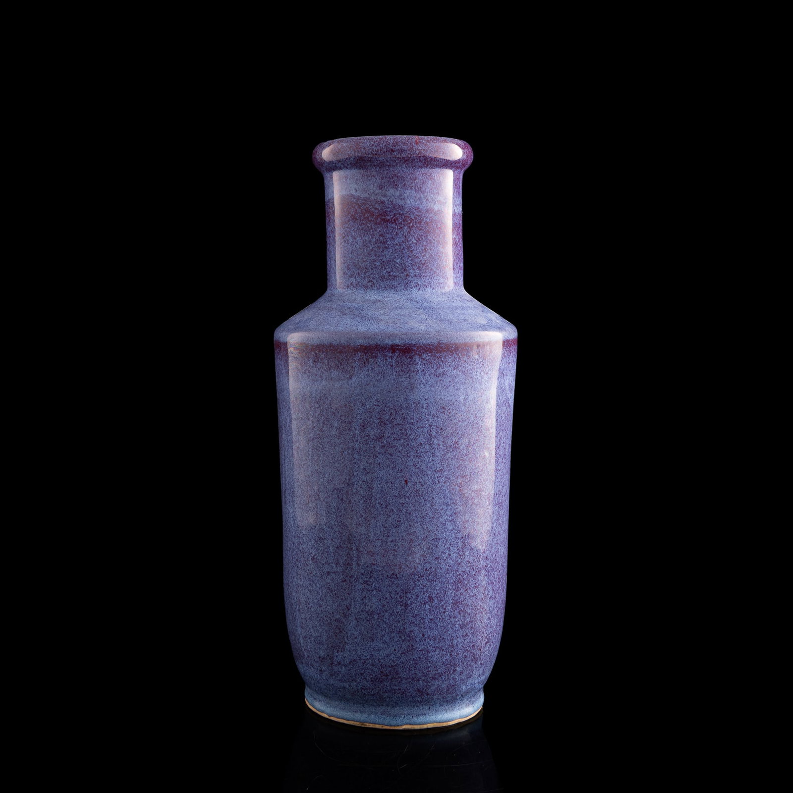 A Chinese flambe-glazed rouleau vase, 19th century or later: A Chinese flambe-glazed rouleau vase 19th century or later Sold with a certificate by Hong Kong Art Craft Merchants Association. H: 16 7/8, Dia: 7 7/8 in. (H: 42.9, Dia: 20 cm.) Private collection, Ro