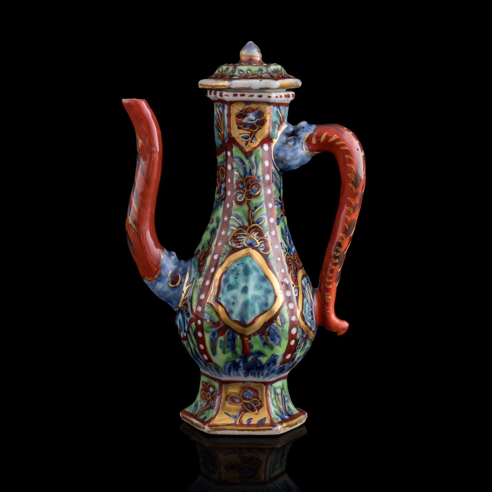 A Chinese blue and enamel beast-head faceted ewer, late 18th century: A Chinese blue and enamel beast-head faceted ewer late 18th century With four-character mark to underside. H: 6 1/4, W: 4, D: 2 1/8 in. (H: 15.9, W: 10.2, D: 5.4 cm.) Private collection, Florida.