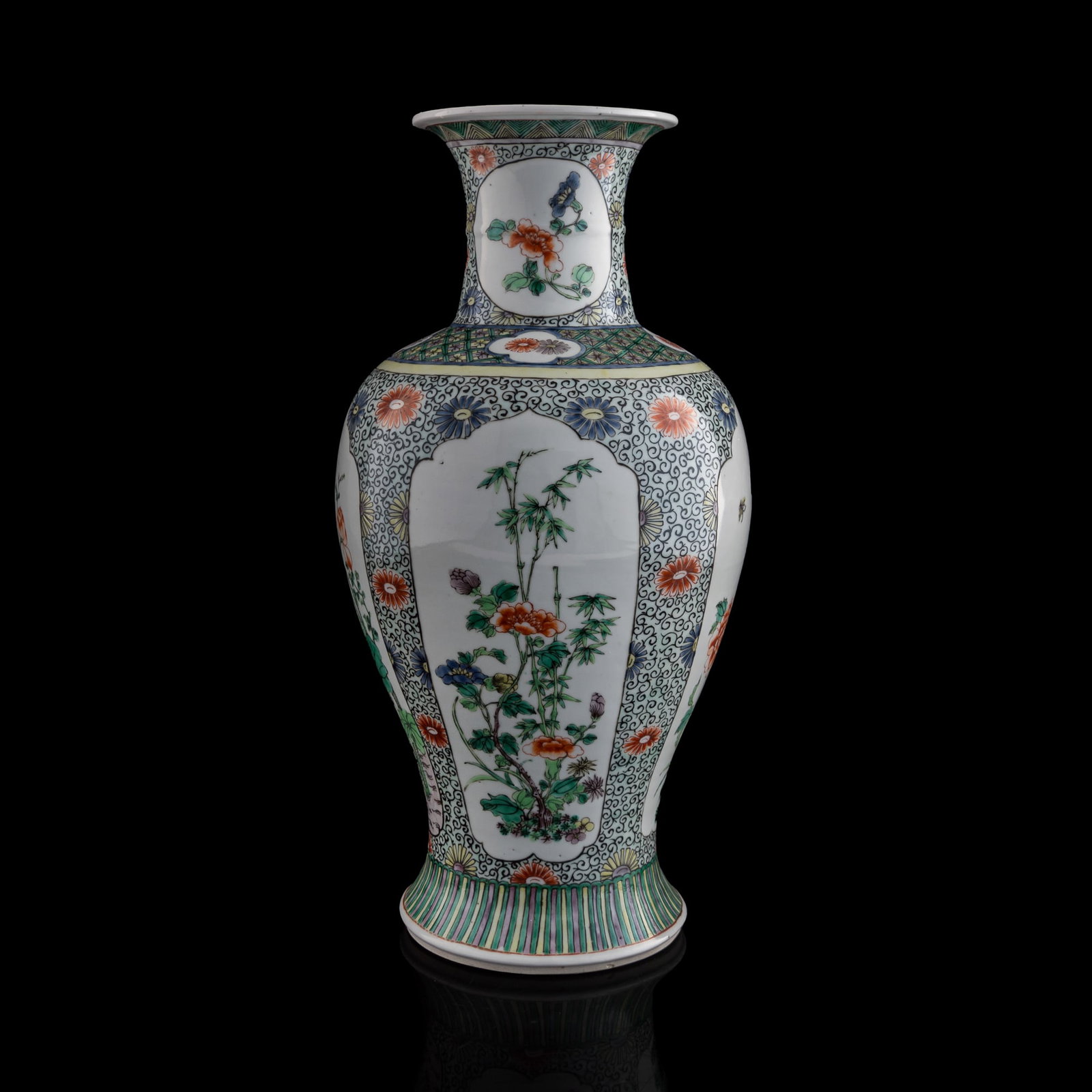 A Chinese wucai 'floral' Guanyin vase, 19th century: A Chinese wucai 'floral' Guanyin vase 19th century H: 17 3/4, Dia: 8 1/2 in. (H: 45.1, Dia: 21.6 cm.) Private collection, Lilburn, Georgia. Click here for h
