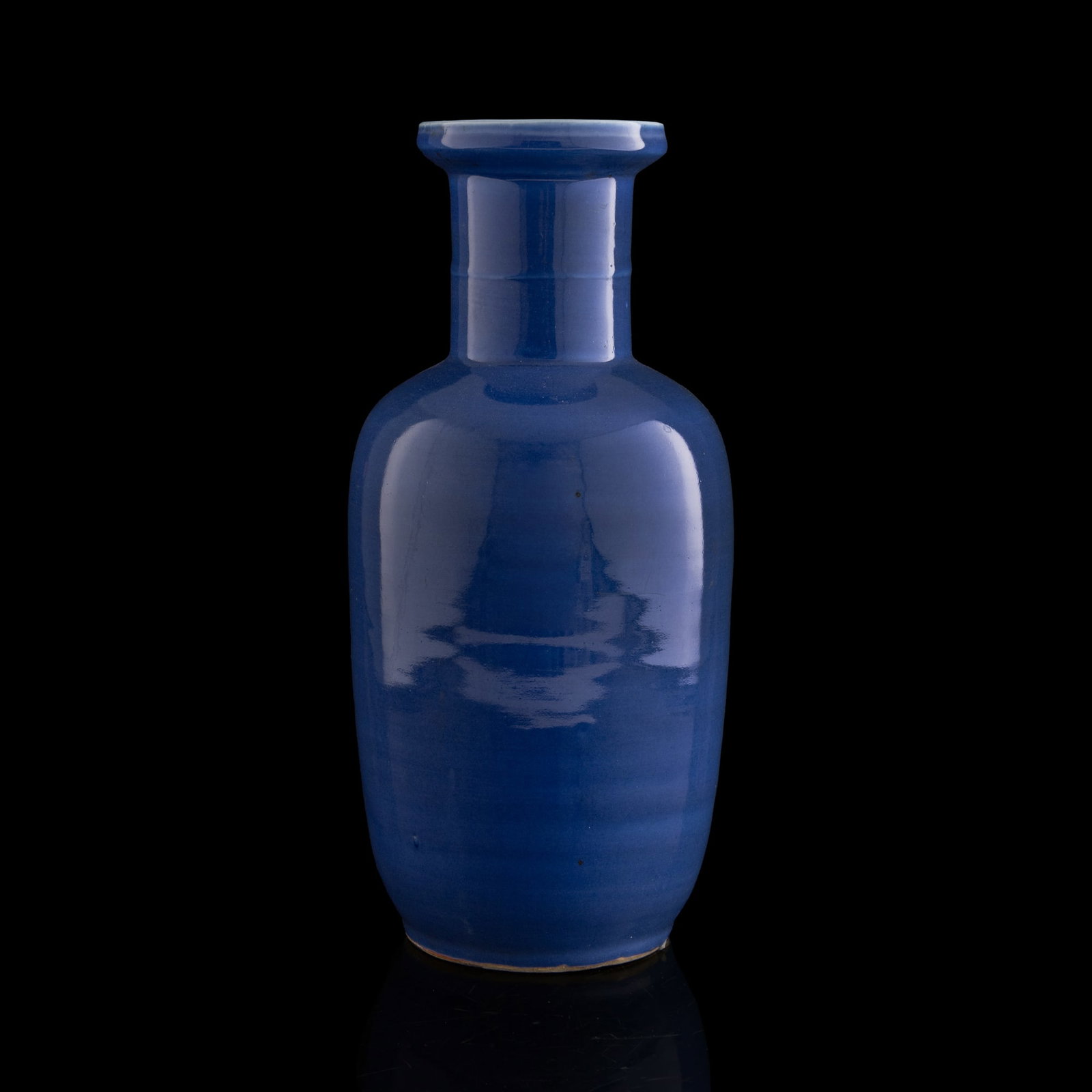 A Chinese blue-glazed rouleau vase, 19th century: A Chinese blue-glazed rouleau vase 19th century H: 17 1/4, Dia: 8 in. (H: 43.8, Dia: 20.3 cm.) Private collection, Dallas, Texas. Click here for high resolu