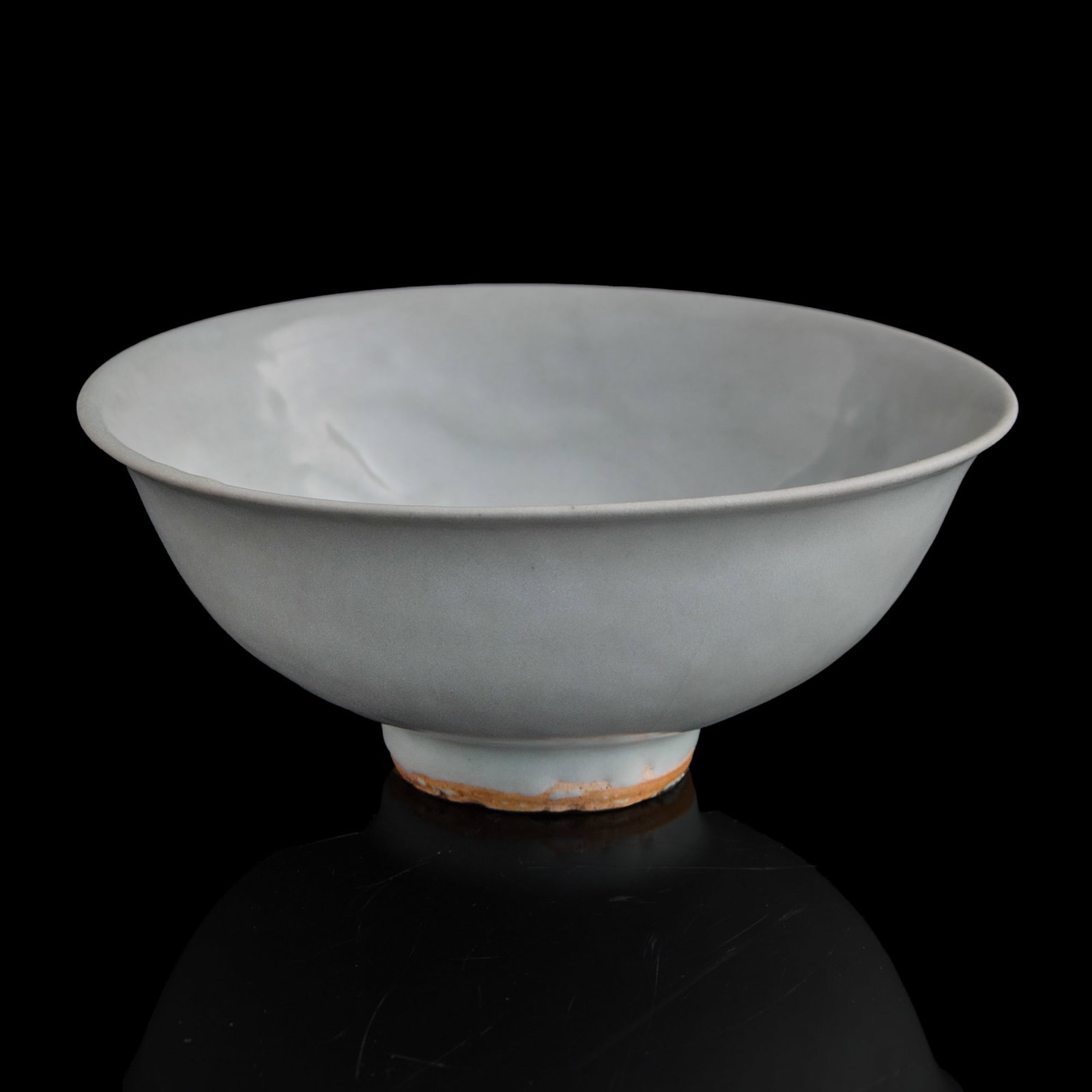 A Chinese egg-white glazed molded bowl, Yuan dynasty (1 of 9)