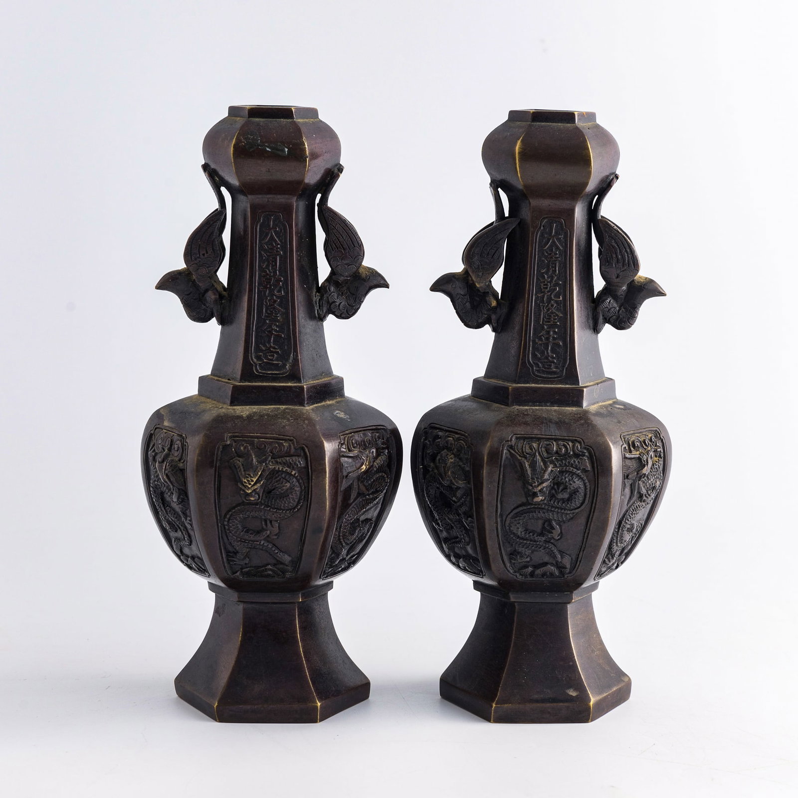 A pair of Chinese hexagonal bronze 'dragon' vases, 19th century (1 of 8)