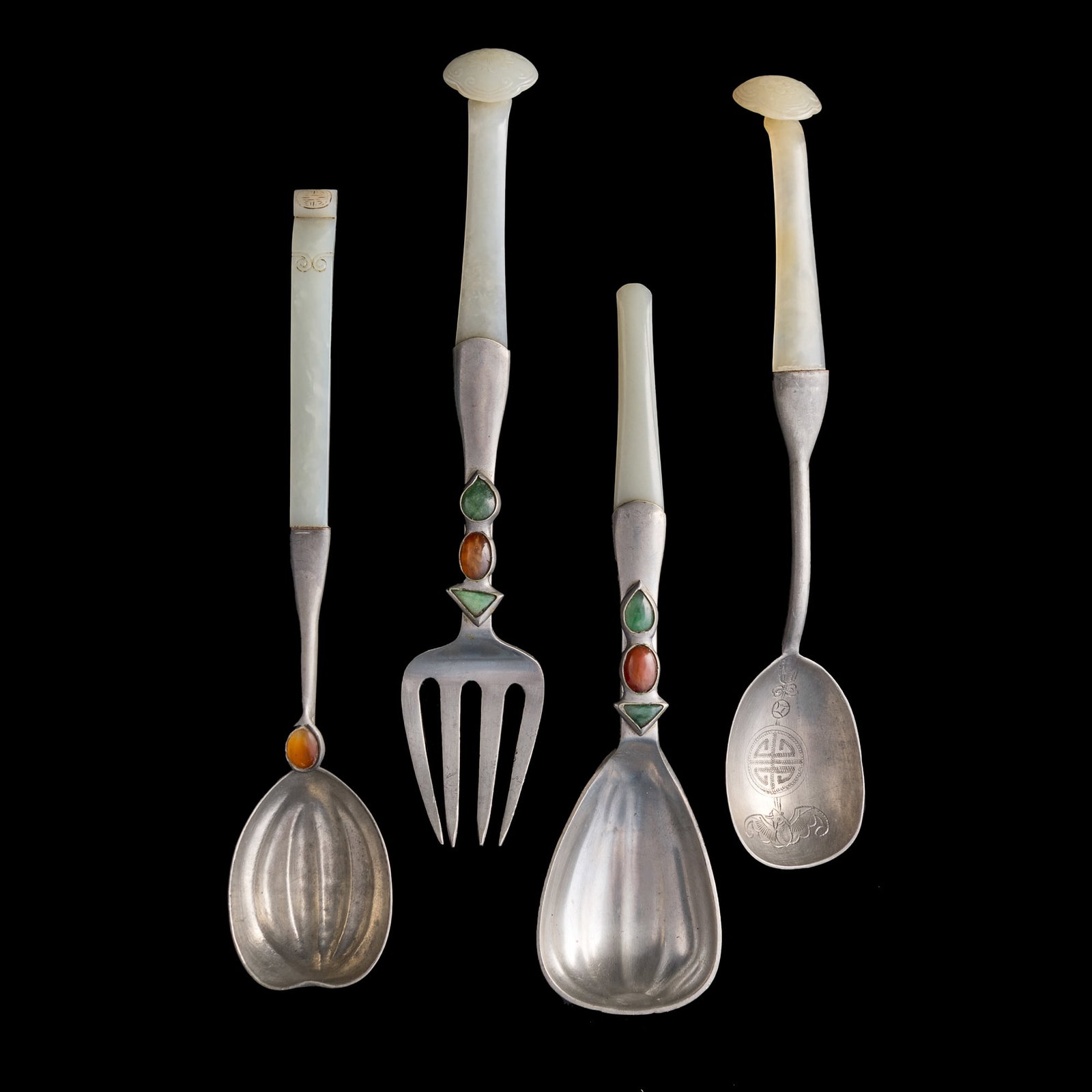 A set of three Chinese jade-handled pewter spoons and a fork, Qing dynasty/Republic period (1 of 10)