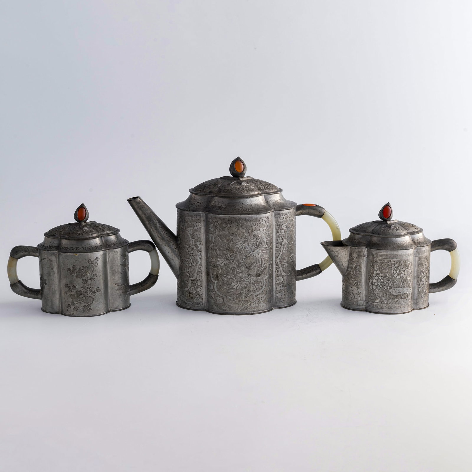 A Chinese three-piece pewter tea set, Qing dynasty/Republic period (1 of 12)