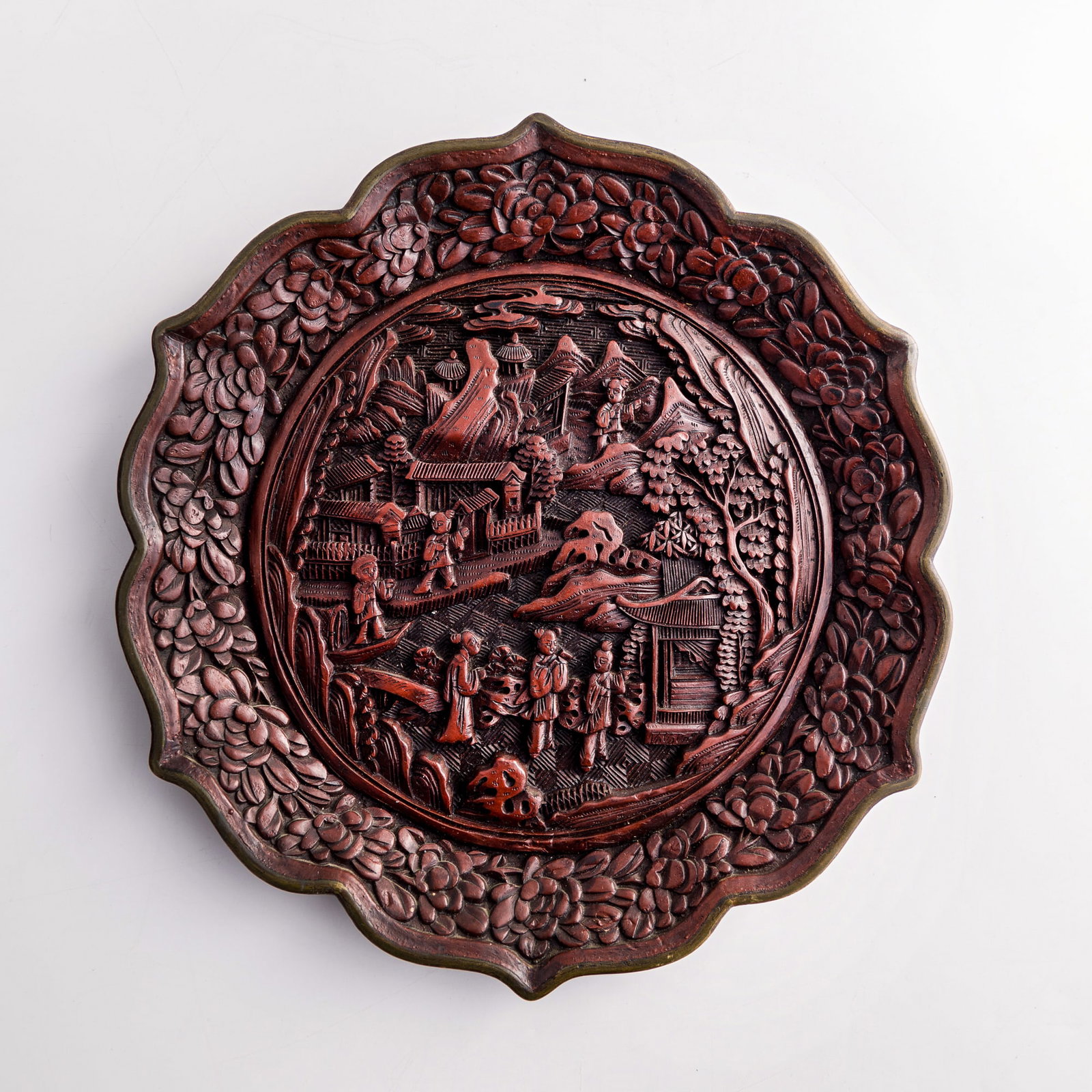 A Chinese copper-bodied cinnabar 'landscape' and 'figure' plate, 19th century (1 of 6)