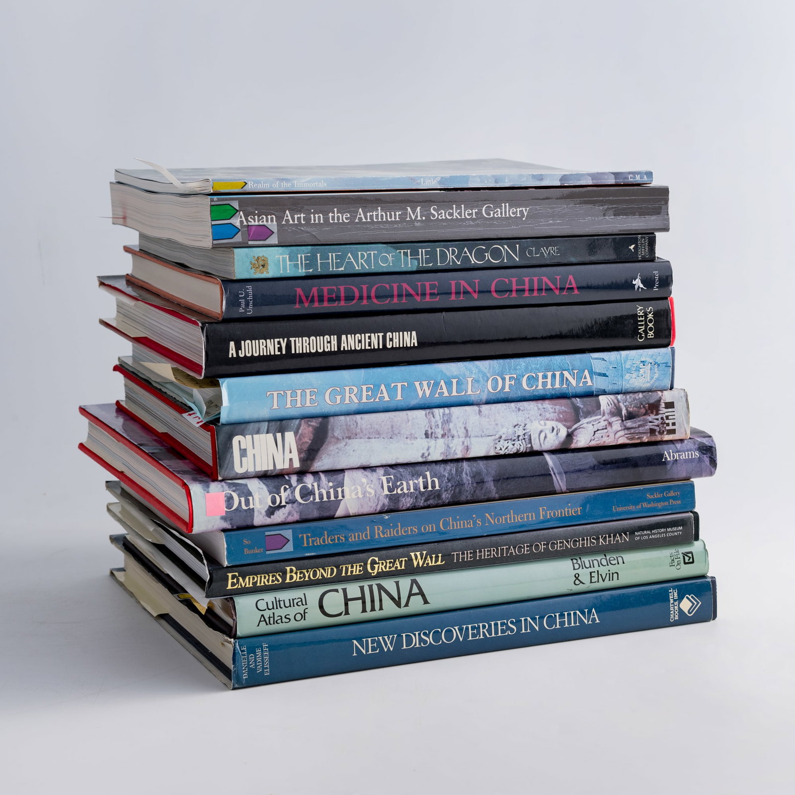 A group of twelve English-language books on Chinese art, history, and culture: A group of twelve English-language books on Chinese art, history, and culture Includes China by Jugoslovenska Revija (1980); The Great Wall of China by Cheng Dalin (1984); A Journey Through Ancient Ch