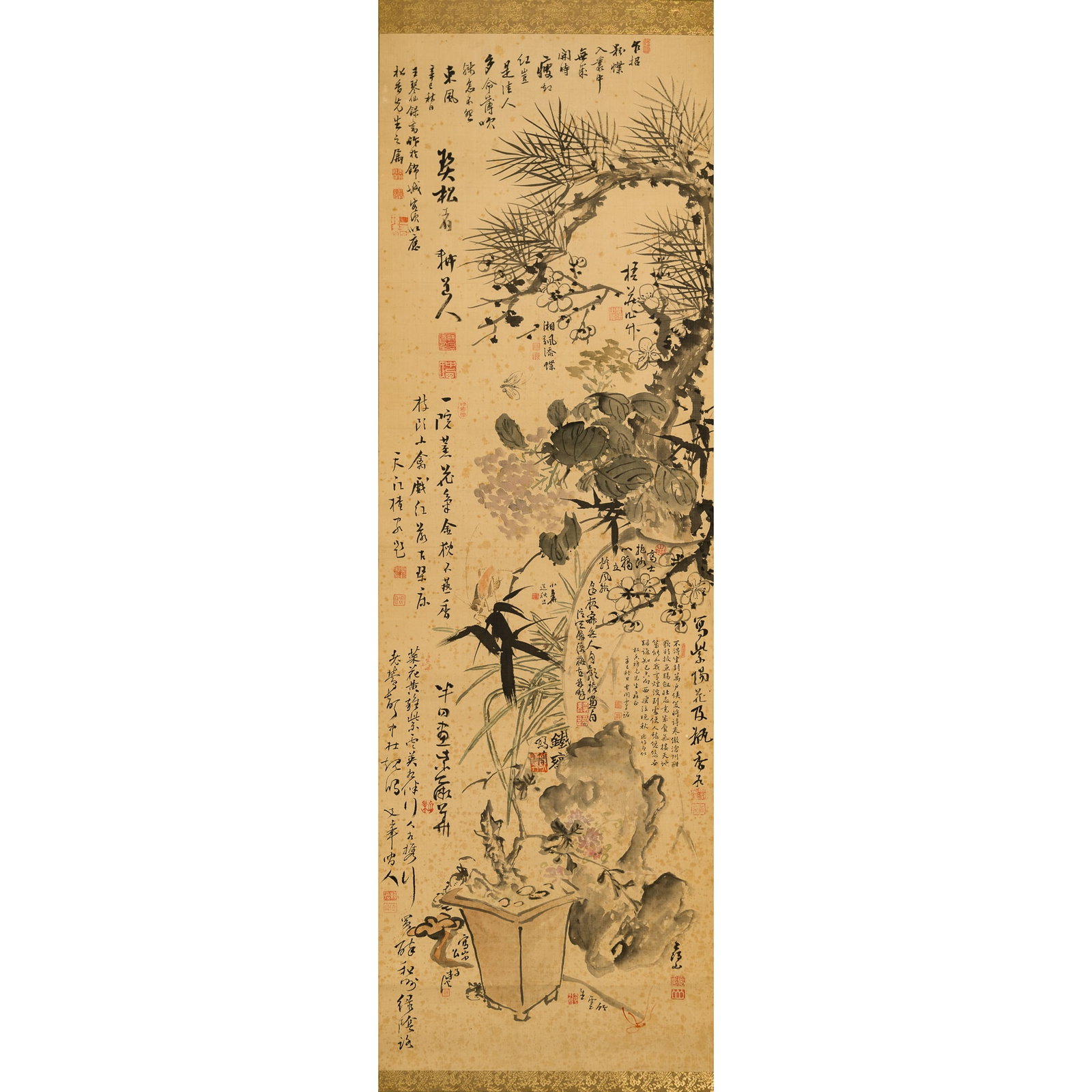 A Chinese collaborative painting, hanging scroll, dated 'xinsi year,' 1941: A Chinese collaborative painting, hanging scroll dated 'xinsi year,' 1941 On silk; with inscriptions and twenty-nine seals by multiple artists. One inscription, dated to the xinsi year (1941), was wri