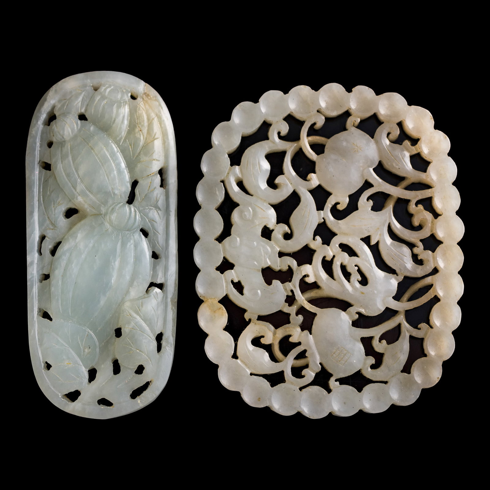 A Chinese white jade plaque and a 'fu shou' pendant, 18th/19th century (1 of 7)