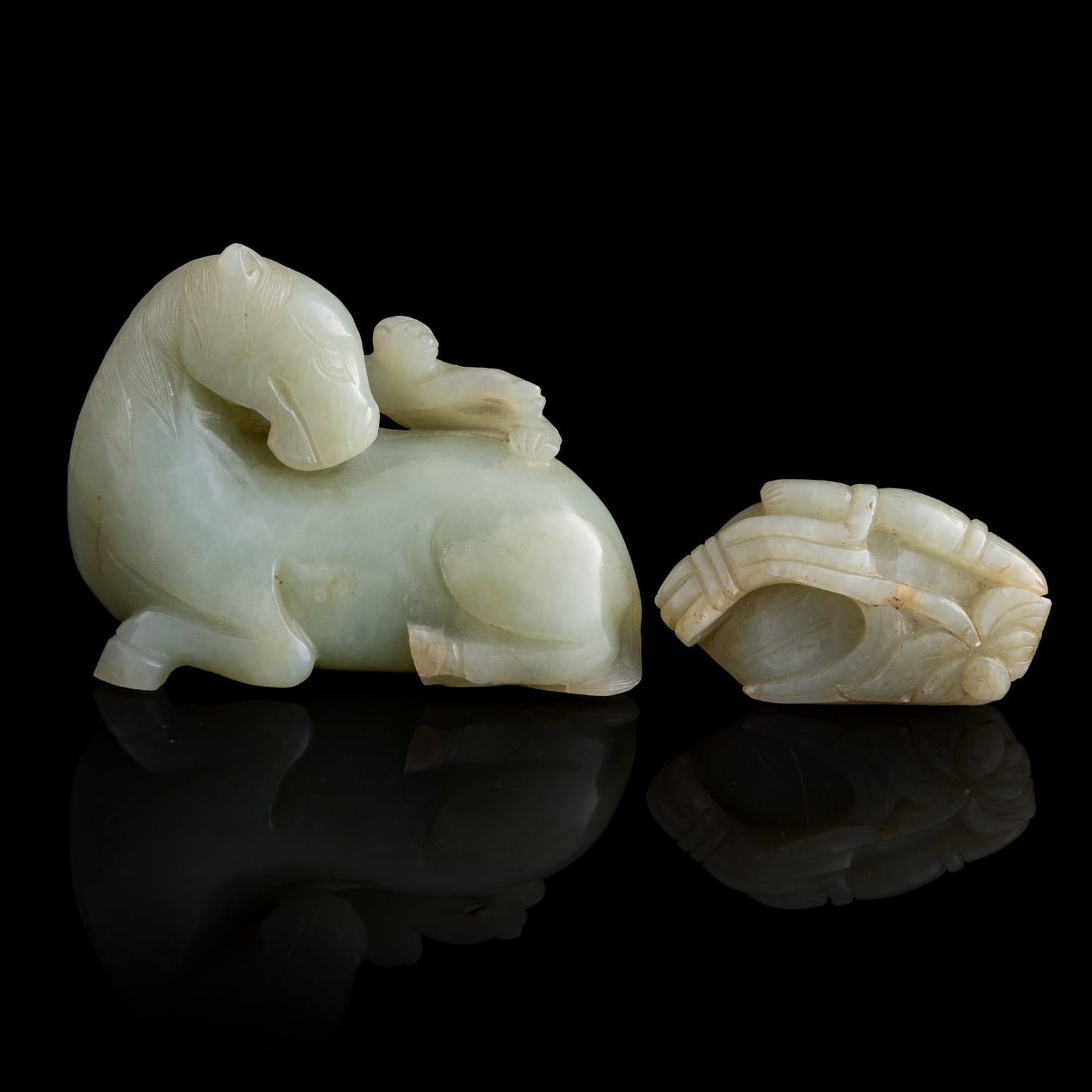 A Chinese jade 'monkey on horseback' carving and lotus pendant, Qing dynasty (1 of 12)