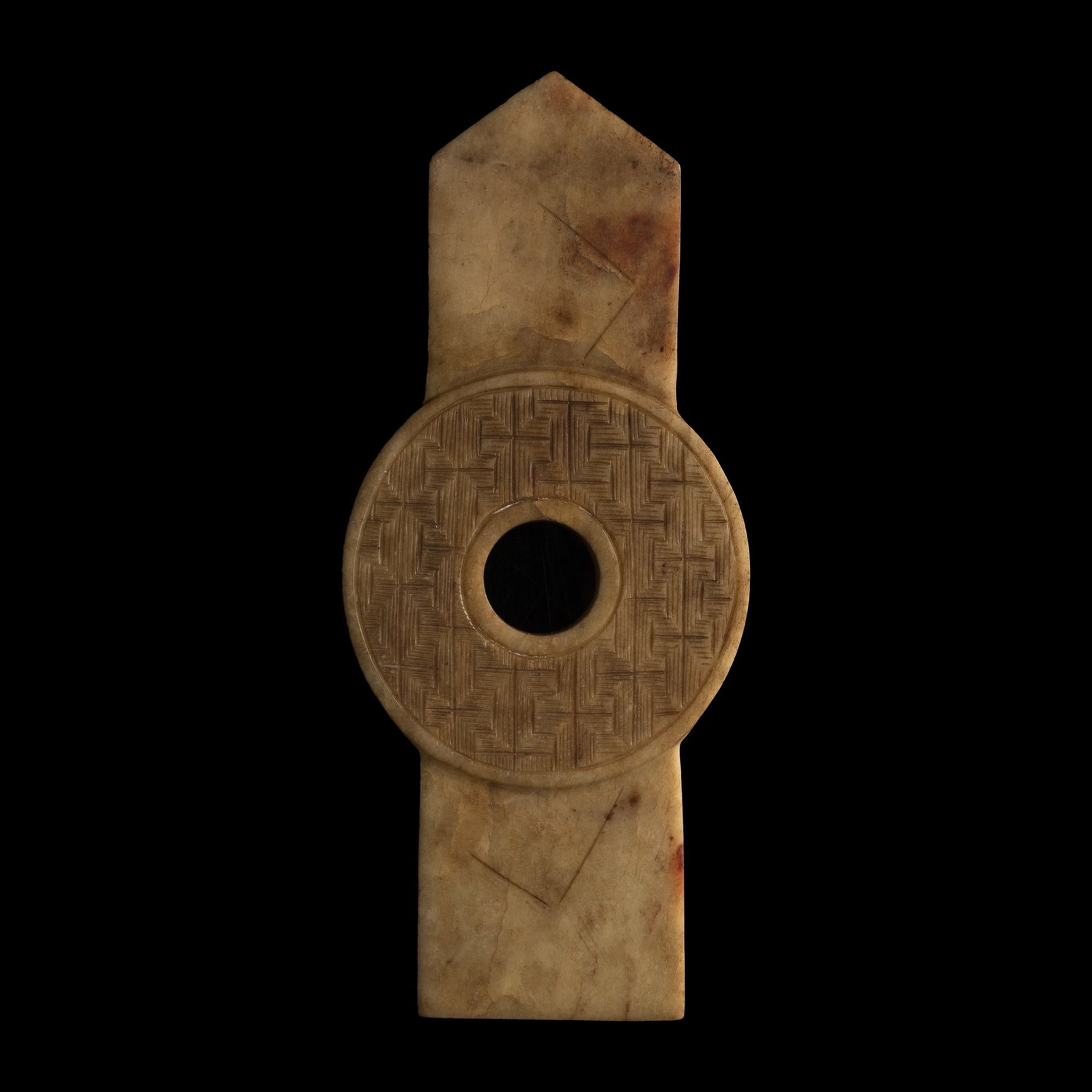 A Chinese jade 'chilong' gui-form bi disc, Ming dynasty: A Chinese jade 'chilong' gui-form bi disc Ming dynasty Sold with associated brocade box. H: 9 5/8, W: 4 1/4, D: 1/2 in. (H: 24.4, W: 10.8, D: 1.3 cm.) From an estate in San Diego, California.