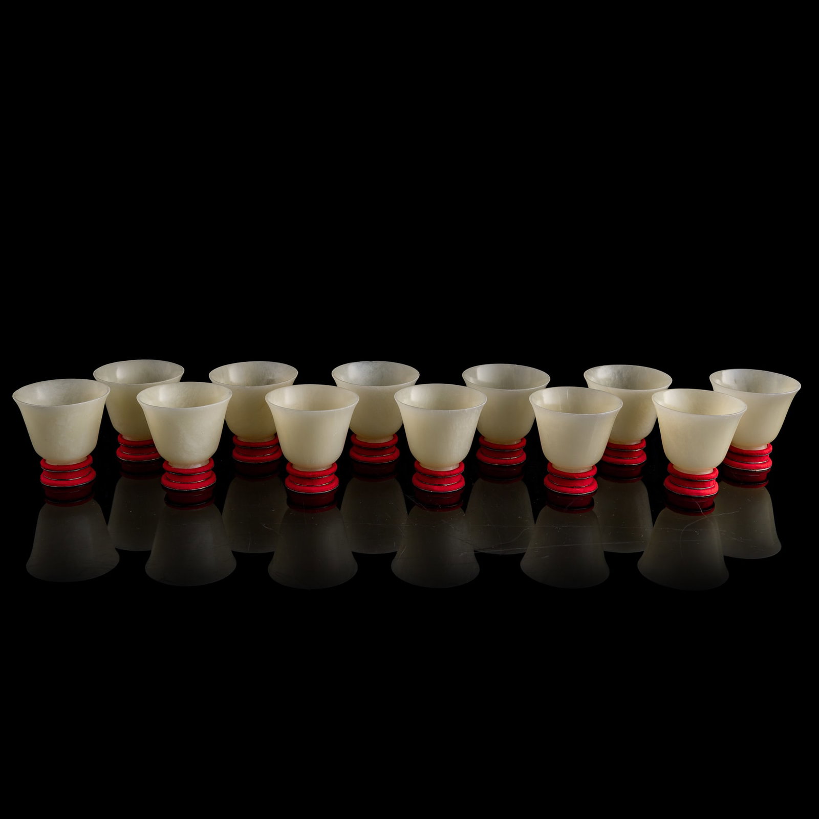 A set of twelve Chinese jade cups, 19th century (1 of 9)