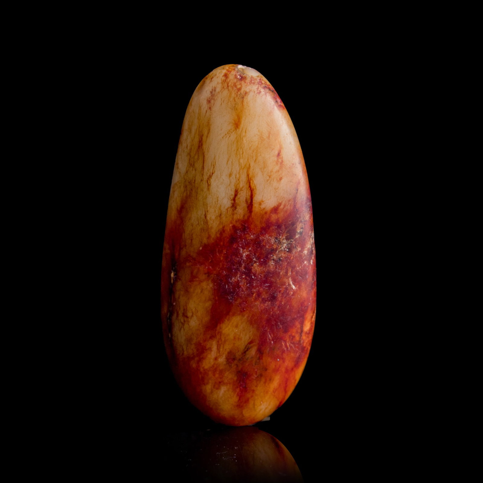 A Chinese jade pebble pendant, Qing dynasty (1 of 9)