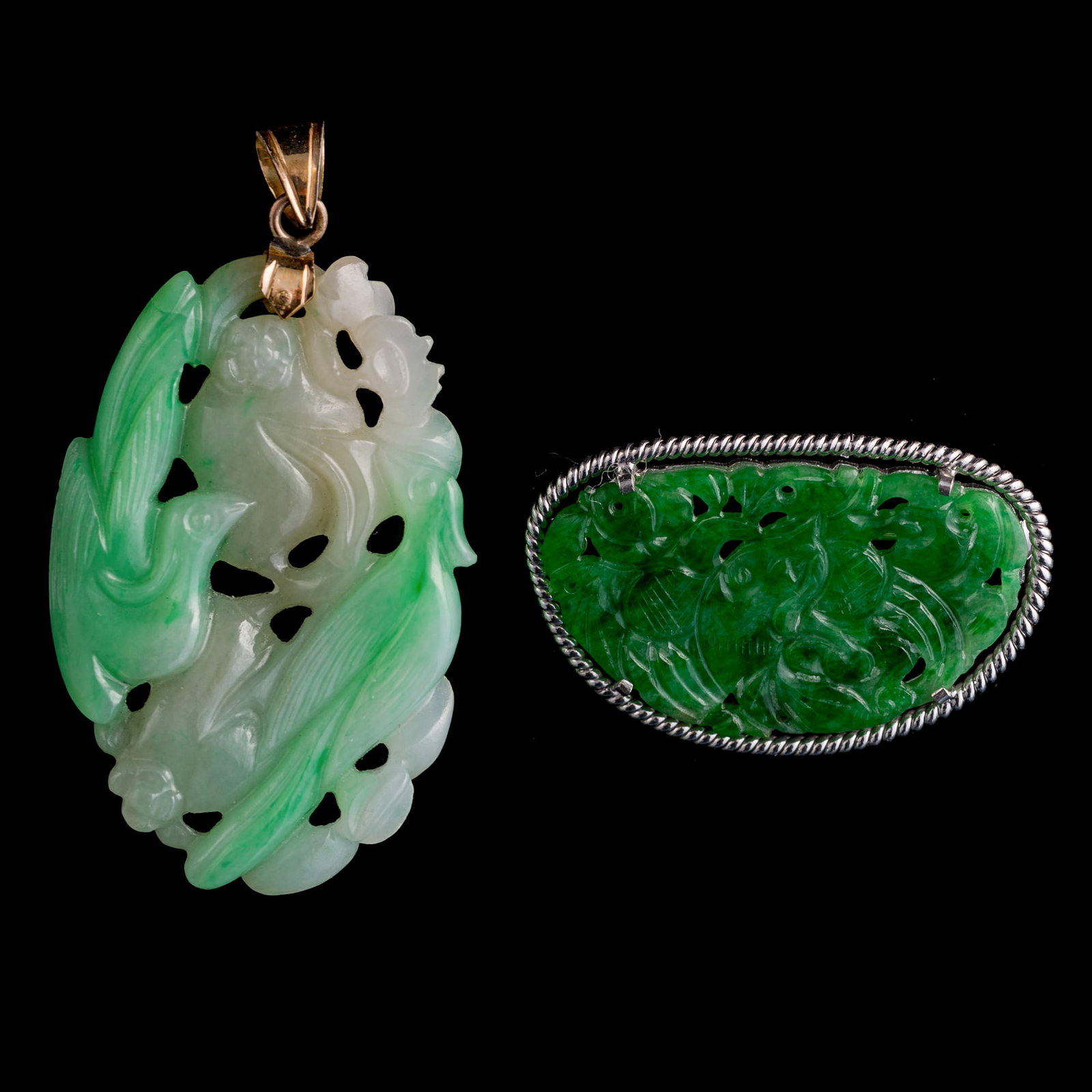Two Chinese jadeite jewelry pieces, Qing dynasty: Two Chinese jadeite jewelry pieces Qing dynasty Comprising a metal-mounted brooch marked "18K" to the reverse, and a 'flower and bird’ pendant marked "14K" to the bail. (2). H: 1 5/8, W: 1 1/8, D: 3