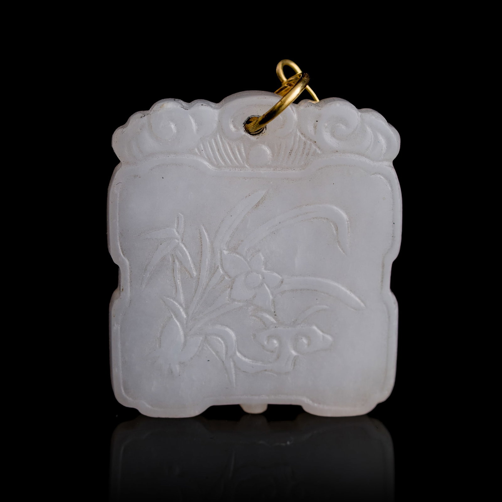 A Chinese white jade 'lingzhi and narcissus' plaque, 18th century (1 of 8)