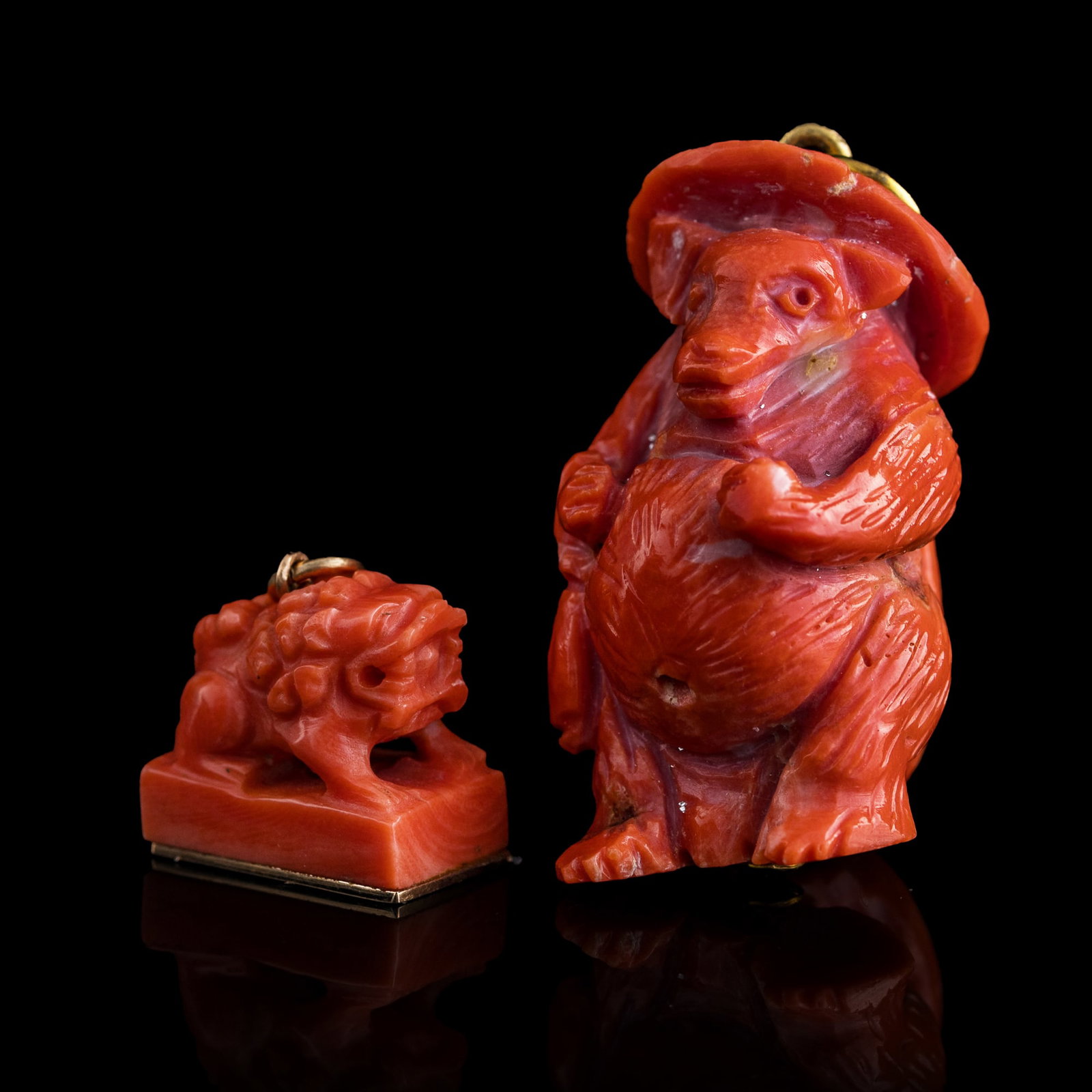 A Chinese coral pendant and seal, 19th century: A Chinese coral pendant and seal 19th century H: 1 1/2, W: 3/4, D: 1 in. (H: 3.8, W: 1.9, D: 2.5 cm. (largest)) Weight: 21.76 g (overall) From Mrs. Hillebrand of Chicago, Illinois. Her father-in-law a