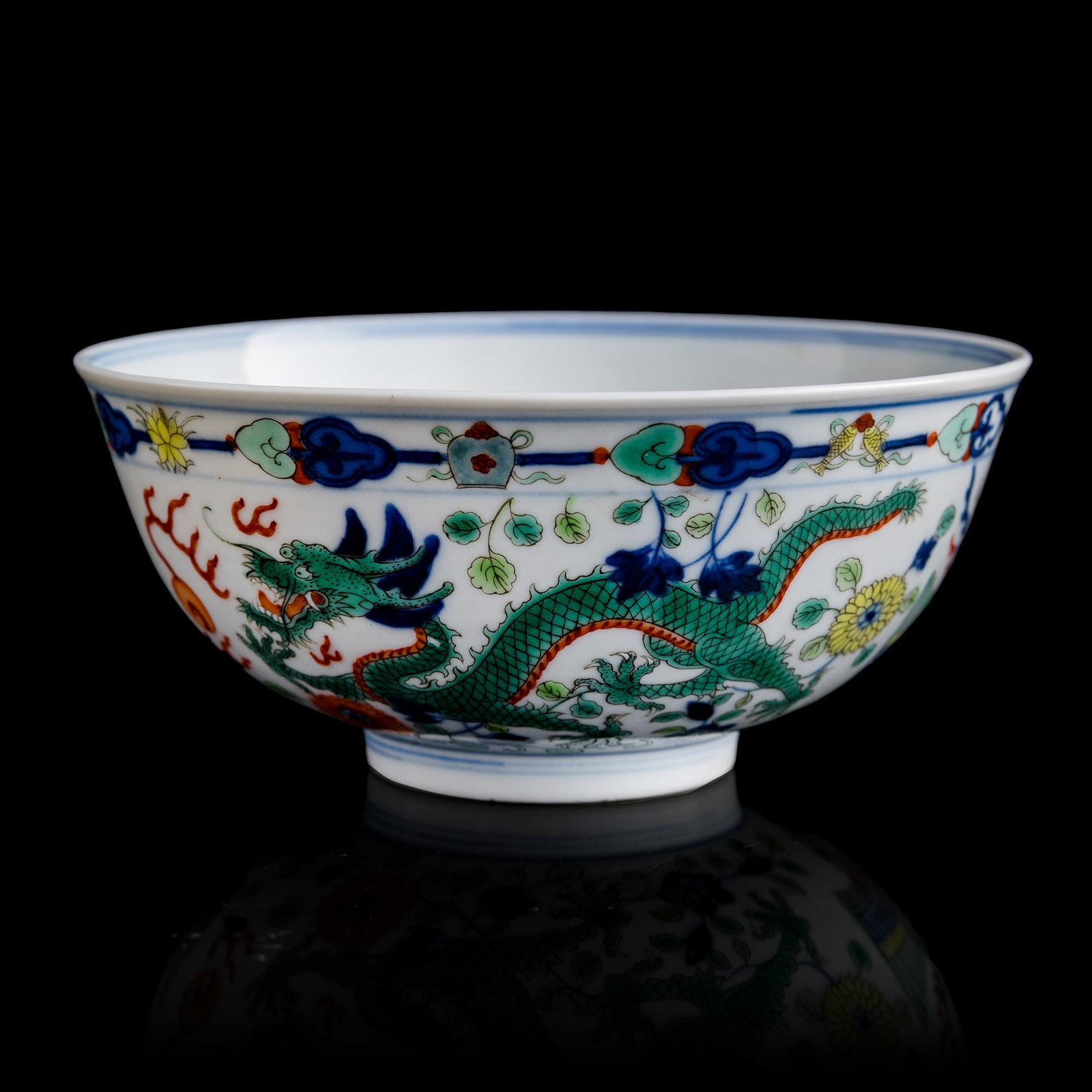 A Chinese blue and white wucai dragon and phoenix bowl, Guangxu period (1 of 8)