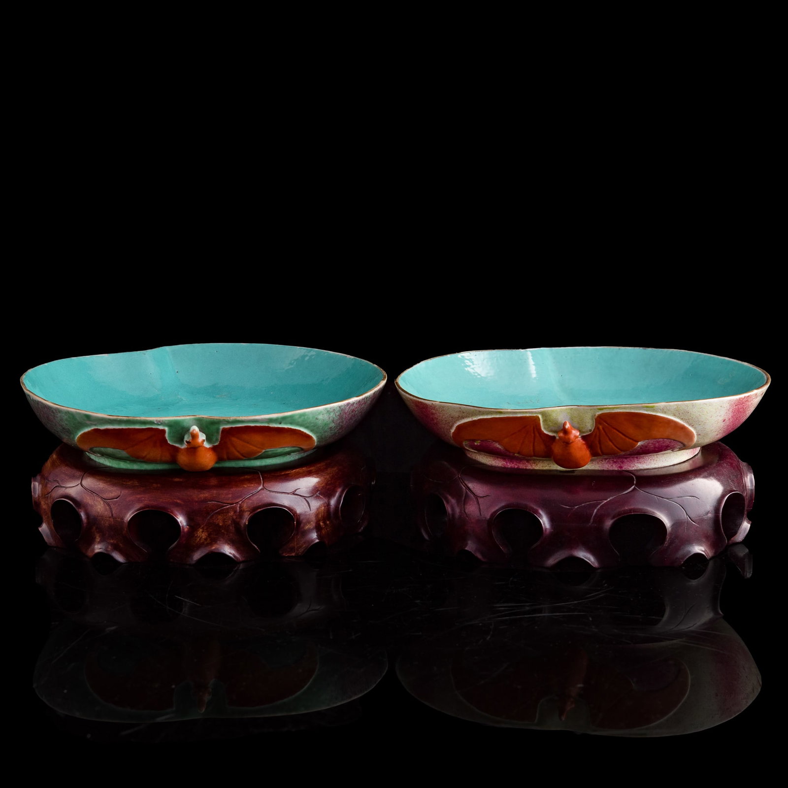 A pair of Chinese famille rose peach-form washers, 19th century: A pair of Chinese famille rose peach-form washers 19th century Sold with two associated wooden stands. (2). H: 2, W: 9 1/8, D: 9 1/2 in. (H: 5.1, W: 23.2, D: 24.1 cm. (washer, each)) Private collectio