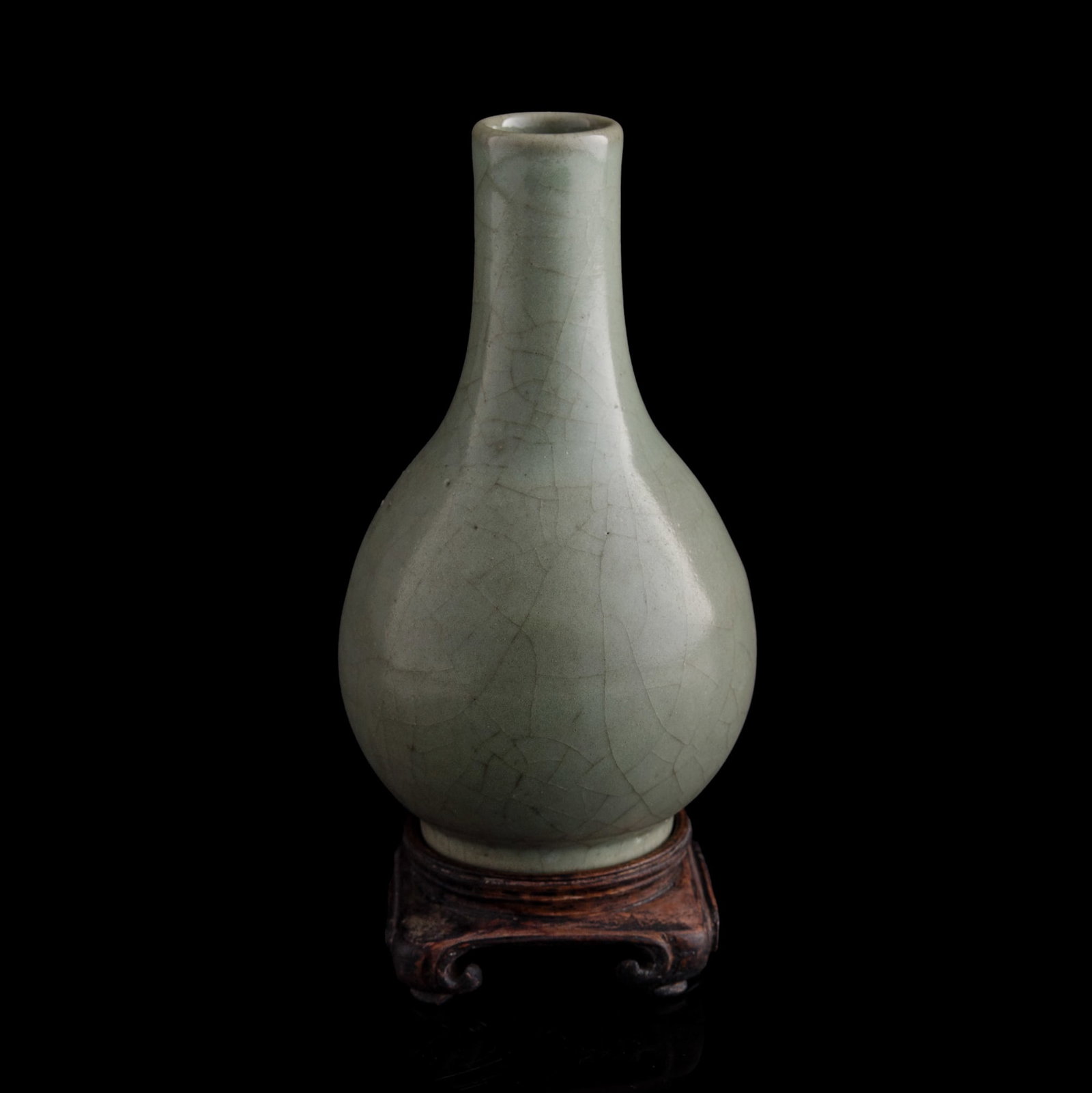 A Chinese Guan-type-glazed danping vase, 17th/18th century: A Chinese Guan-type-glazed danping vase 17th/18th century Sold with original hardwood stand. H: 5 5/8, Dia: 3 1/8 in. (H: 14.3, Dia: 7.9 cm. (vase)) From Mr. Kwok of Vancouver, Canada. Inherited from 