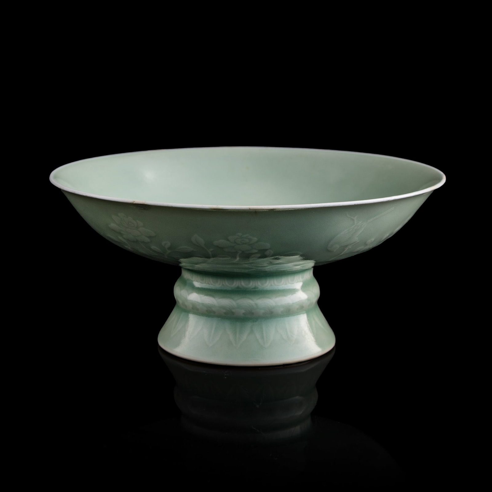 A Chinese celadon-glazed 'flower' stem bowl, Yongzheng period, Qing dynasty (1 of 10)